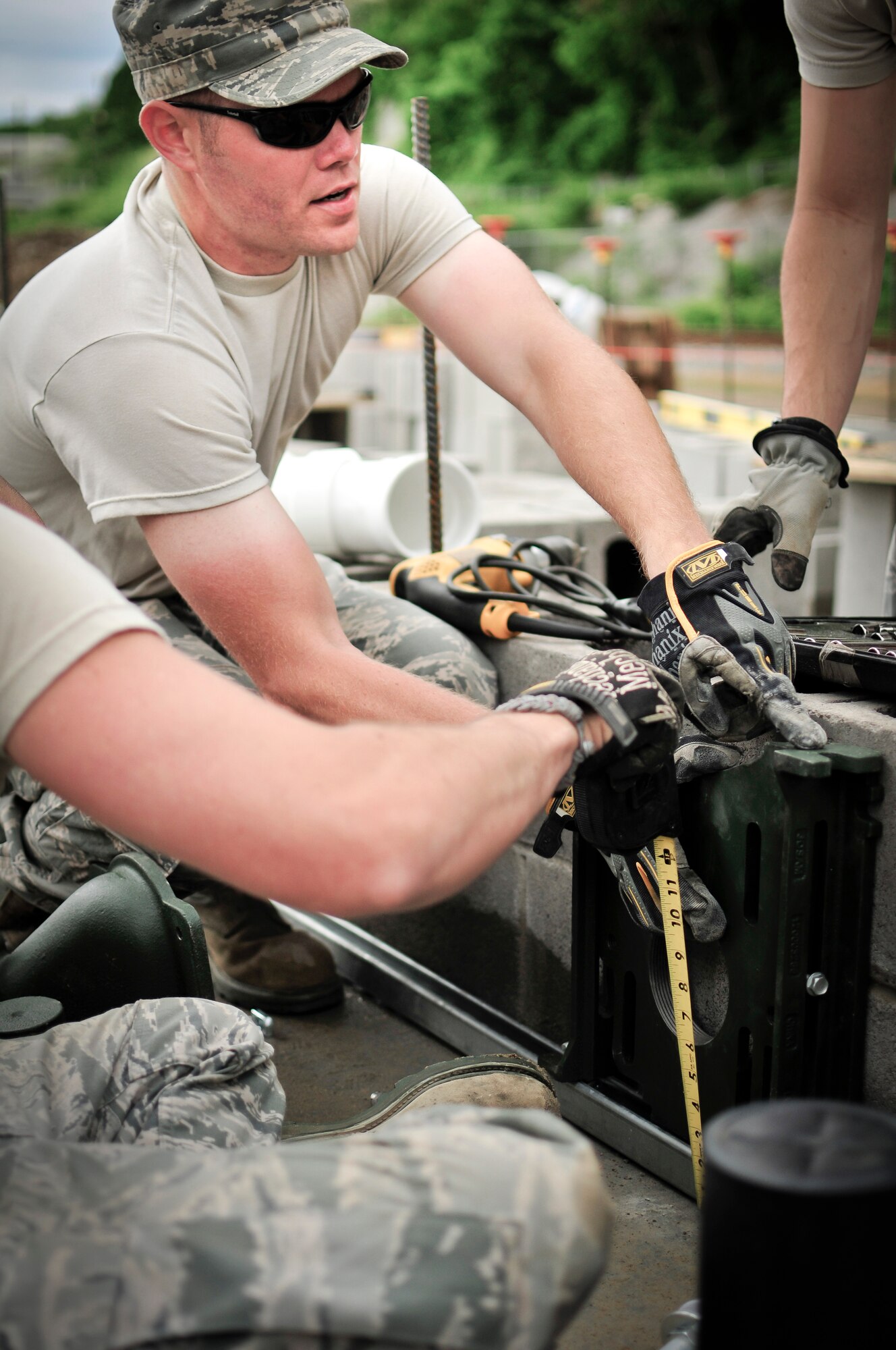 Members of the 134th Air Refueling Wing's Civil Engineer Squadron put their team building skills to work to construct a new building at the U.S. Coast Guard Academy, New London, Conn. during a DFT.  Collaborations such as this between sister services is a win-win for all.  (U.S. Air National Guard photo by Staff Sgt. Ben Mellon, 134 ARW Public Affairs)