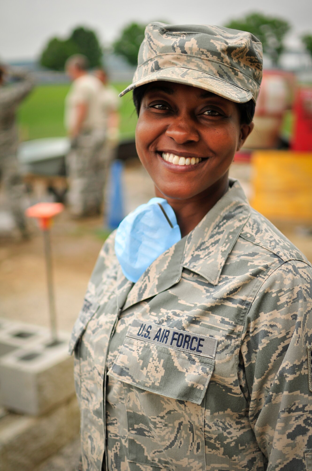 Tech. Sgt. Jeela Matthews,134th Civil Engineer Squadron, assists in the construction of a new building at the U.S. Coast Guard Academy, New London, Conn. during a DFT.  Teamwork is highly stressed in the military and members are encouraged to work together to get the tasks completed more efficiently.  (U.S. Air National Guard photo by Staff Sgt. Ben Mellon, 134 ARW Public Affairs)