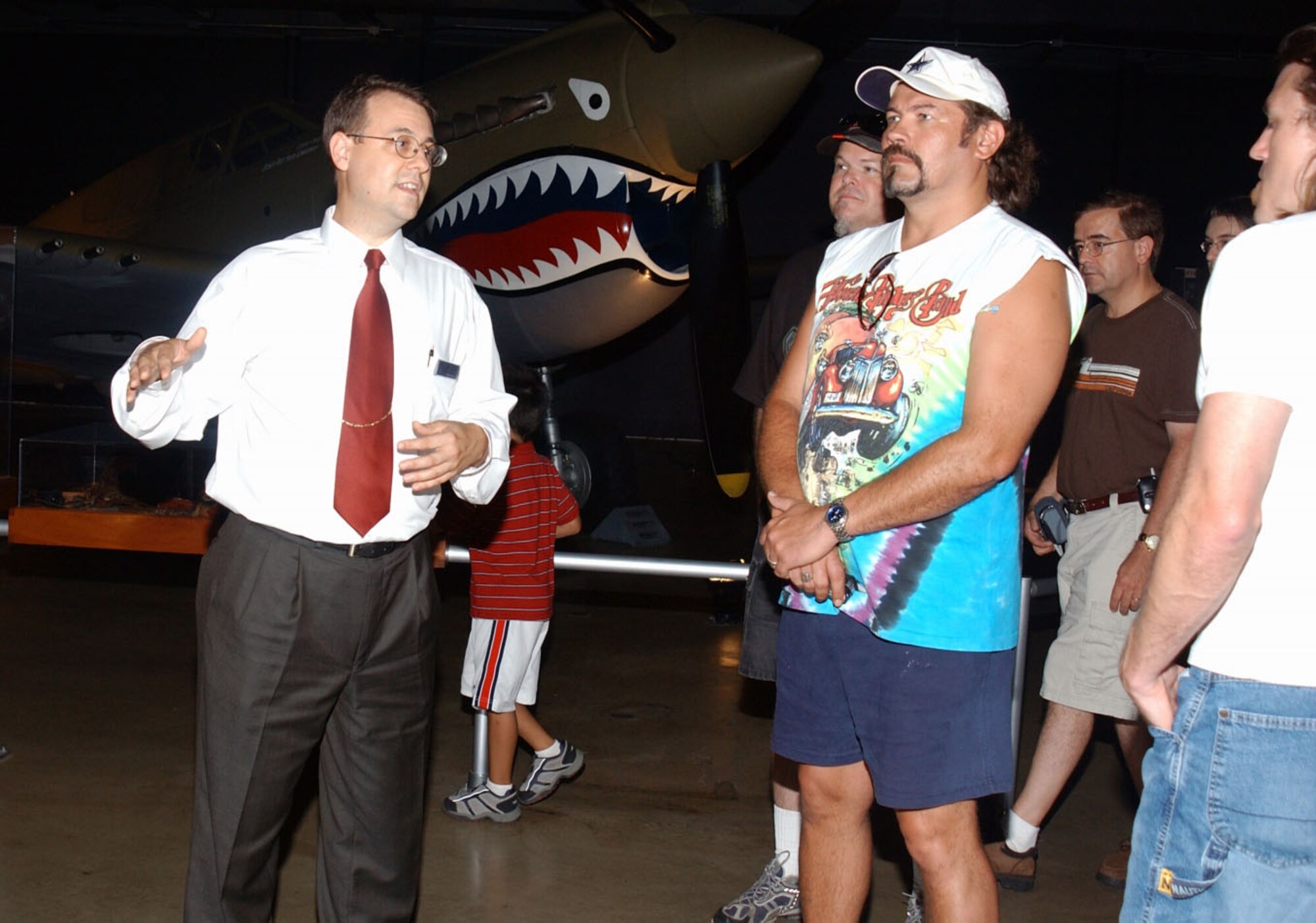 DAYTON, Ohio -- Country music singer Buddy Jewell learns about Air Force history from Museum Curator Jeff Duford in 2005. (U.S. Air Force photo)
