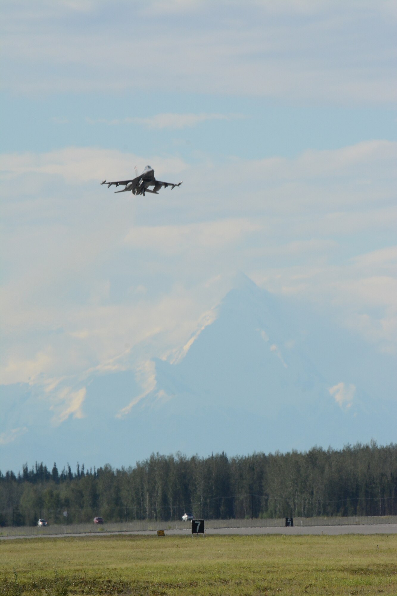 An F-16 Fighting Falcon from the 115th Fighter Wing in Madison, Wis., prepares for landing during the RED FLAG-Alaska exercise at Eielson Air Force Base, Alaska, Aug. 11, 2014. Approximately 130 Airmen from the 115 FW participated in the event, refreshing skills and working in real-world scenarios to test their combat abilities in a high-paced environment. (Air National Guard photo by Staff Sgt. Ryan Roth)