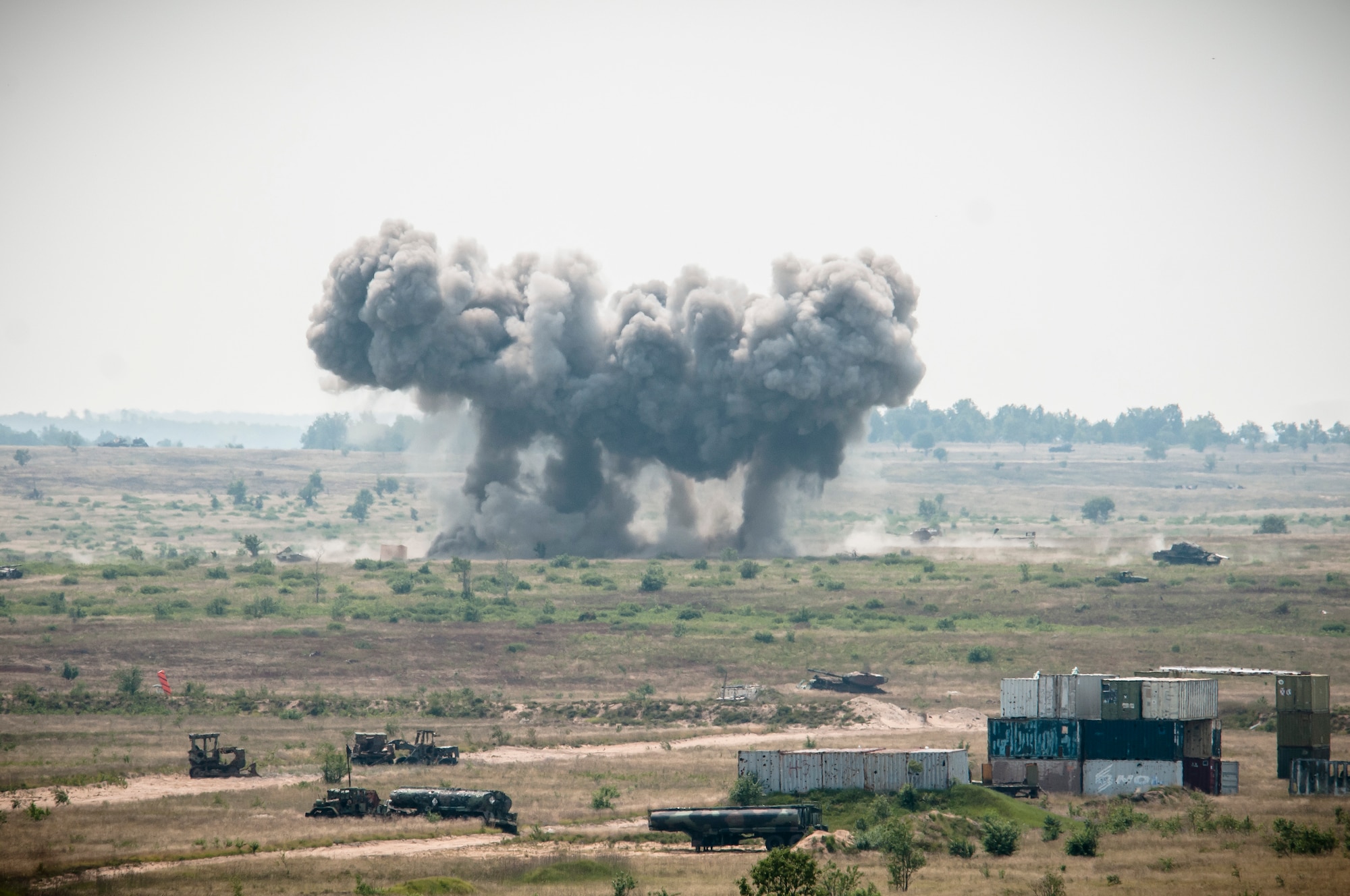 An A-10 Thunderbolt II from the 127th Wing, Selfridge Air National Guard Base, Mich. drops live Mark 82, 500 pound bombs during Operation Northern Strike 2014 near Grayling, Mich. on Aug. 8, 2014. Operation Northern Strike 2014 is a joint multi-national combined arms training exercise conducted in Michigan. (U.S. Air National Guard photo by Master Sgt. Scott Thompson/released)
