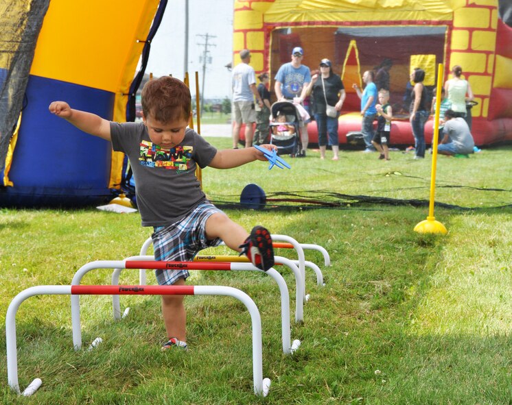 Members of the 914th and their families enjoy lunch and festivities as part of Family Day here, August 2, 2014. Family Day is an annual event which allows members to spend time with their families on base. (U.S. Air Force photo by Staff Sgt. Stephanie Clark)