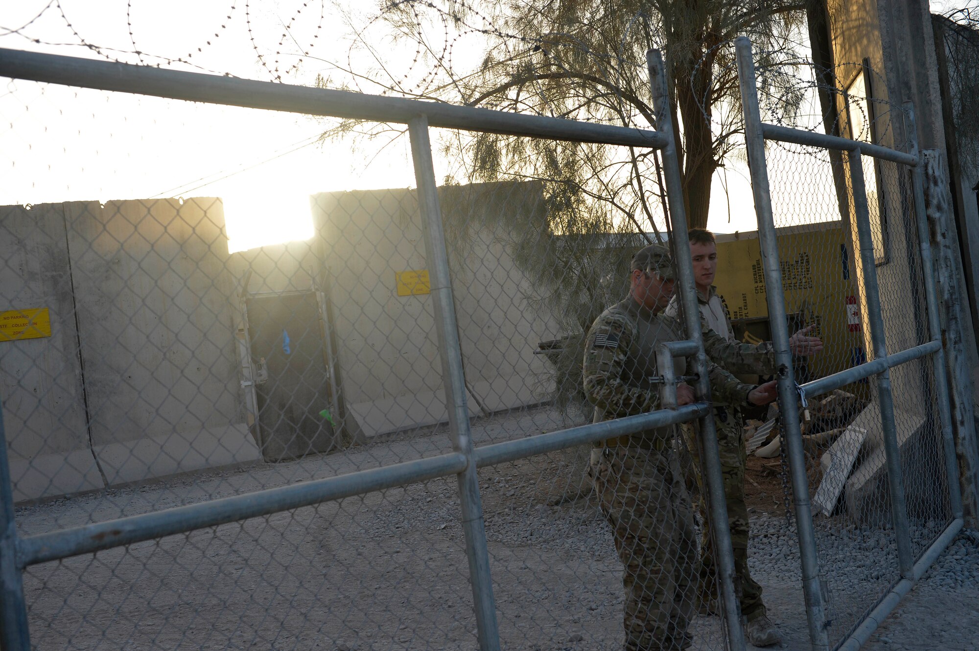Two U.S. Air Force Airmen from the 466th Operating Location Bravo Exlposive Ordnance Disposal flight leave for their final mission at Kandahar Airfield, Afghanistan Aug. 19, 2014.  The unit was created in 2004 to support Commander Kandahar Airfield force protection and provide response for explosive hazard threats.  (U.S. Air Force photo by Staff Sgt. Evelyn Chavez/Released)