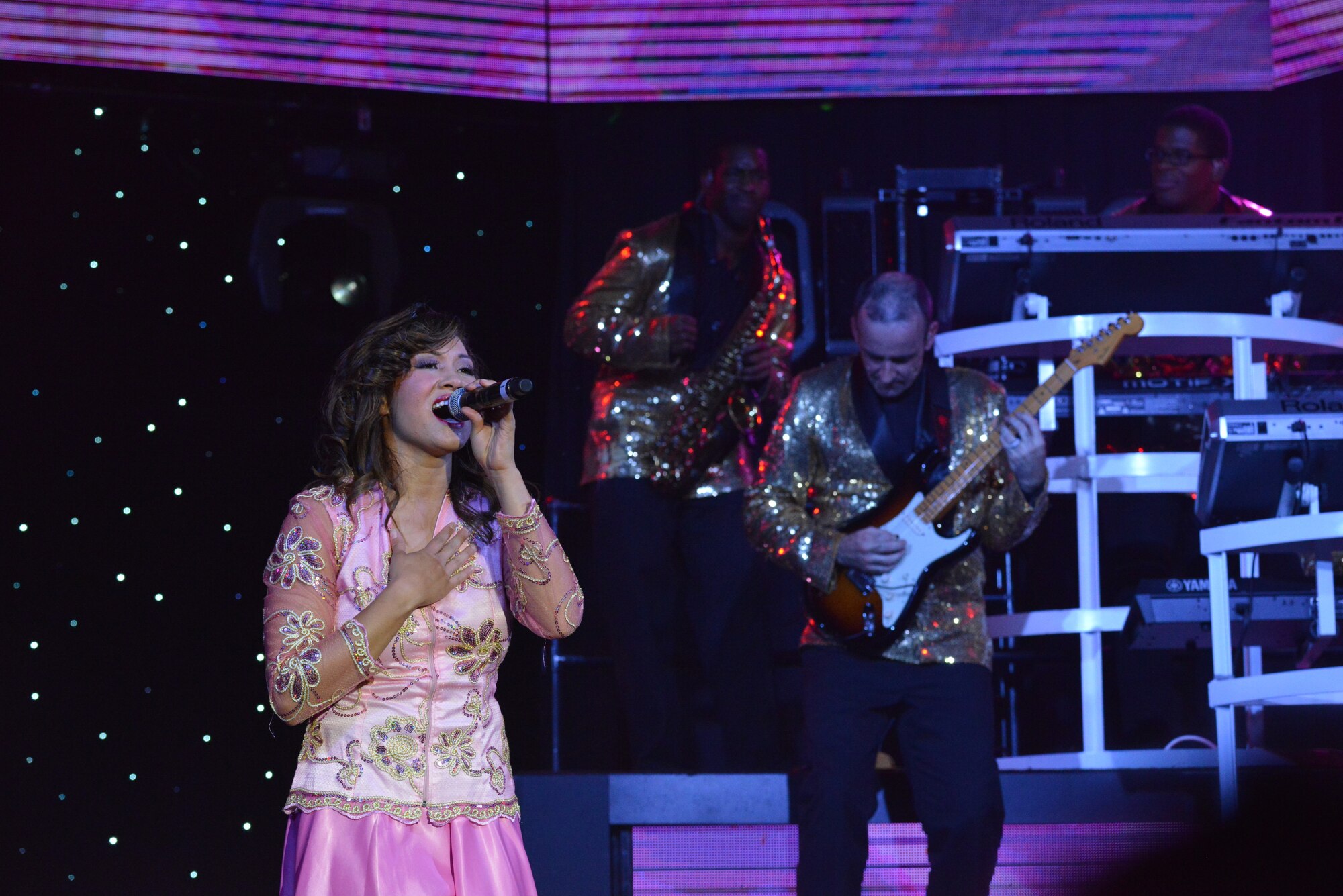 Air Force's entertainment ensemble Tops in Blue, one of the oldest and most widely-traveled entertainment groups of its kind, performs Aug. 24 at the Kiva Auditorium in downtown Albuquerque.  (Photo by Ken Moore)
