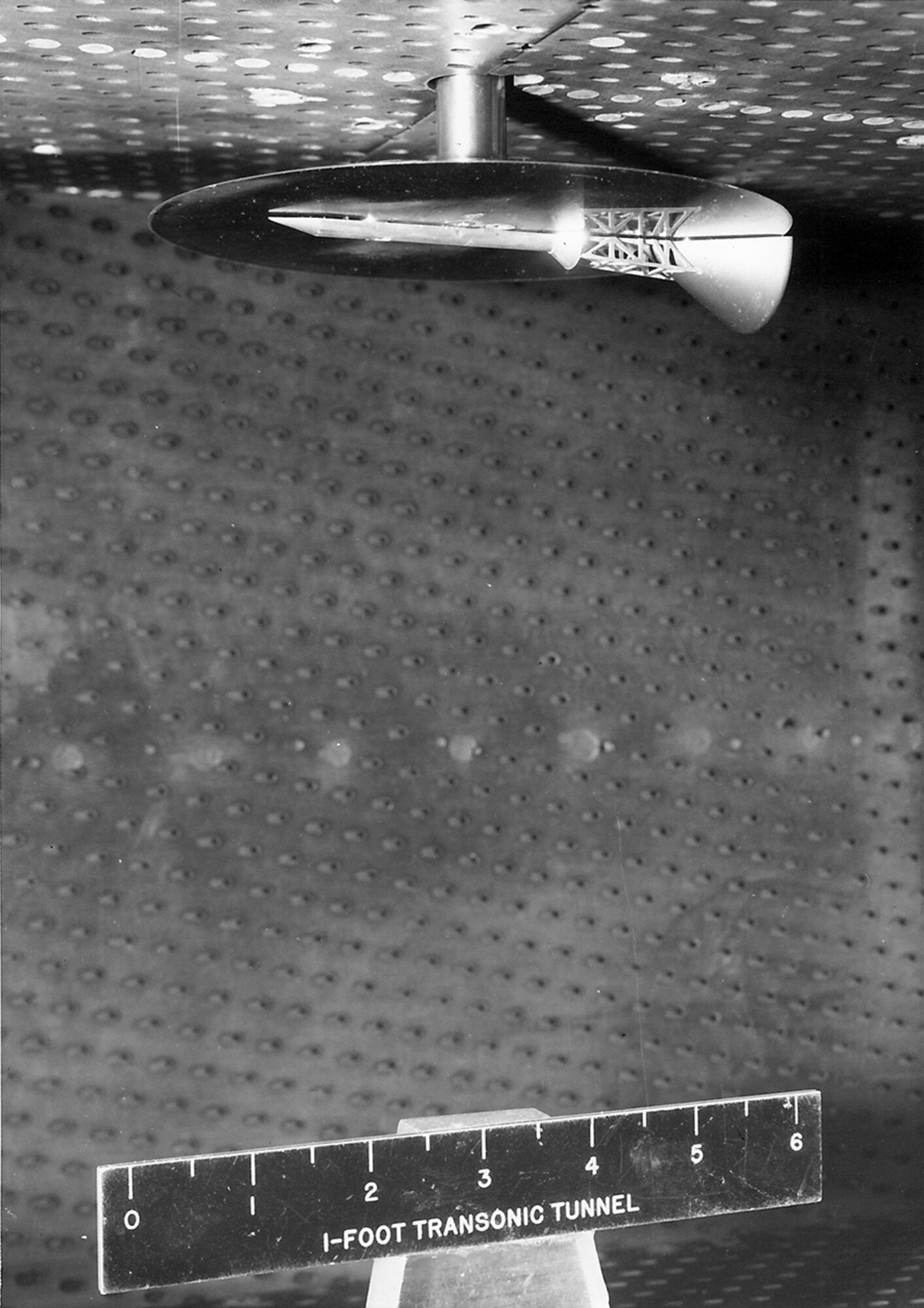 Dr. Bill Baker, the director of the Arnold Engineering Development Complex (AEDC) Analysis and Evaluation Branch, participated in testing the Apollo Escape Module in the AEDC 1-foot transonic wind tunnel (1T) in the 1960s. (AEDC file photo) 