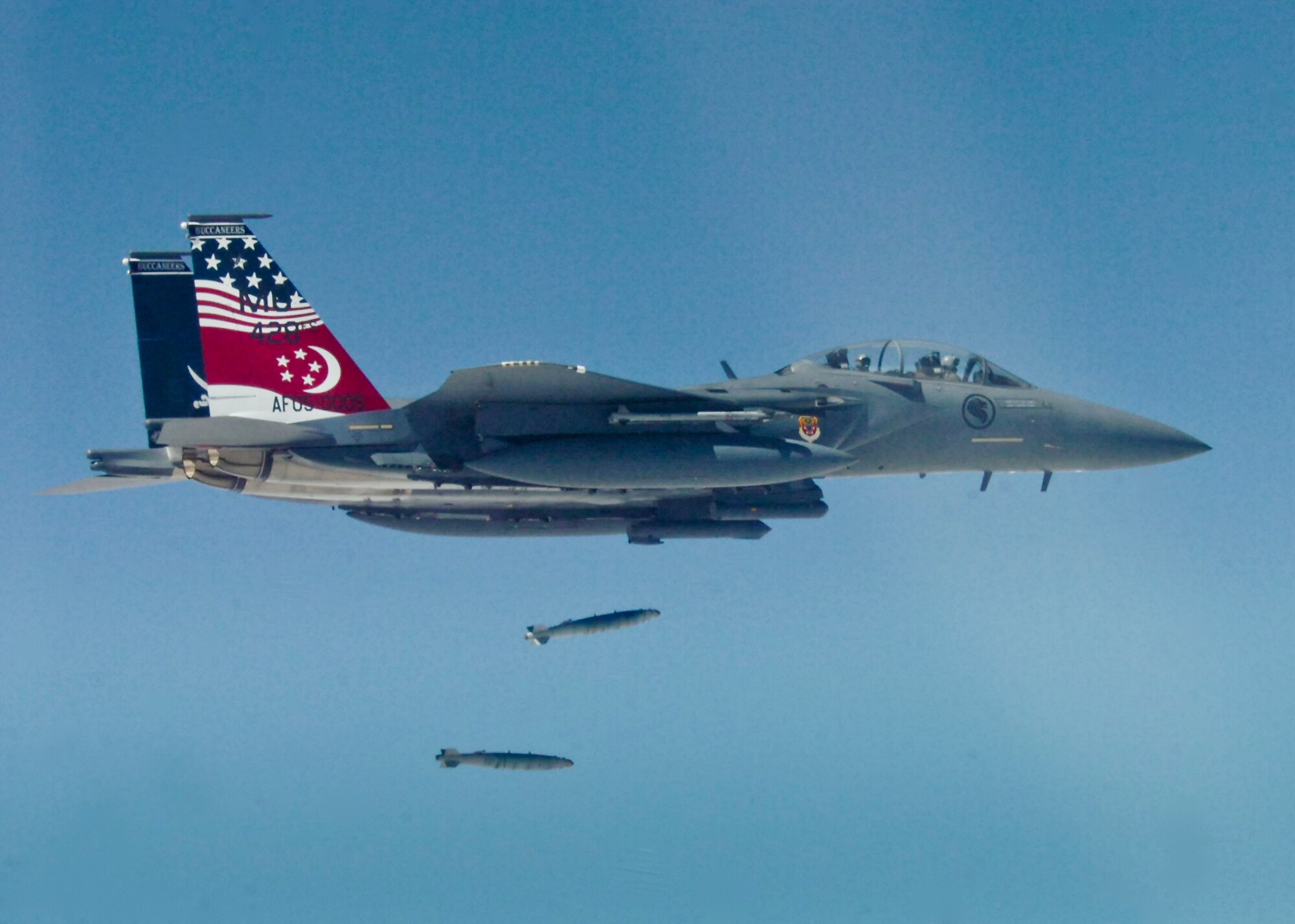 A Singapore air force F-15 drops guided bomb unit-38s during the first week of the weapons system evaluation program that took place at Hill Air Force Base, Utah.  WSEP is an annual training exercise where the effectiveness, maintainability, suitability and accuracy of guided munitions are evaluated.  The program, also known as Combat Archer and Combat Hammer, is managed by the 53rd Weapons Evaluation Group.  The WEG is a geographically separated unit of the 53rd Wing, headquartered at Eglin Air Force Base, Fla.  (Courtesy photo)