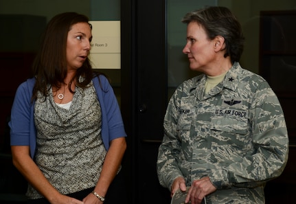 Sarah Winberry, 628th Civil Engineer Squadron installation emergency manager, talks with Brig. Gen. Martha Meeker Aug. 21, 2014, at the emergency operations center on Joint Base Charleston, S.C. Meeker was the 628th Air Base Wing commander from January 2010 to July 2011 and has been the vice commander of the U.S. Air Force Expeditionary Center from July 2012 to present. (U.S. Air Force photo/Airman 1st Class Clayton Cupit)