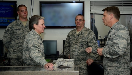 Lt. Col. Warren Brainard, 628th Security Forces commander, talks with Brig. Gen. Martha Meeker Aug. 21, 2014, at the 628th SFS on Joint Base Charleston, S.C. Meeker was the 628th Air Base Wing commander from January 2010 to July 2011 and has been the vice commander of the U.S. Air Force Expeditionary Center from July 2012 to present. (U.S. Air Force photo/Airman 1st Class Clayton Cupit)