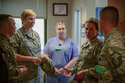 Brig. Gen. Martha Meeker is briefed by 628th Medical Group staff Aug. 21, 2014, at the 628th MDG on Joint Base Charleston, S.C. Meeker was the 628th Air Base Wing commander from January 2010 to July 2011 and has been the vice commander of the U.S. Air Force Expeditionary Center from July 2012 to present. (U.S. Air Force photo/Airman 1st Class Clayton Cupit)