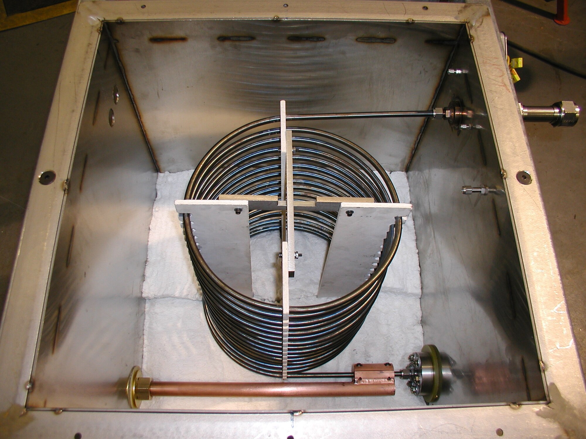Coils, such as this, are an integral part of the new Heated Fuel System (HFS) in the Aerodynamic and Propulsion Test Unit (APTU). The new HFS has been designed and built at Arnold Engineering Development Complex (AEDC) in support of the AFRL’s Medium Scale Critical Components (MSCC) program.