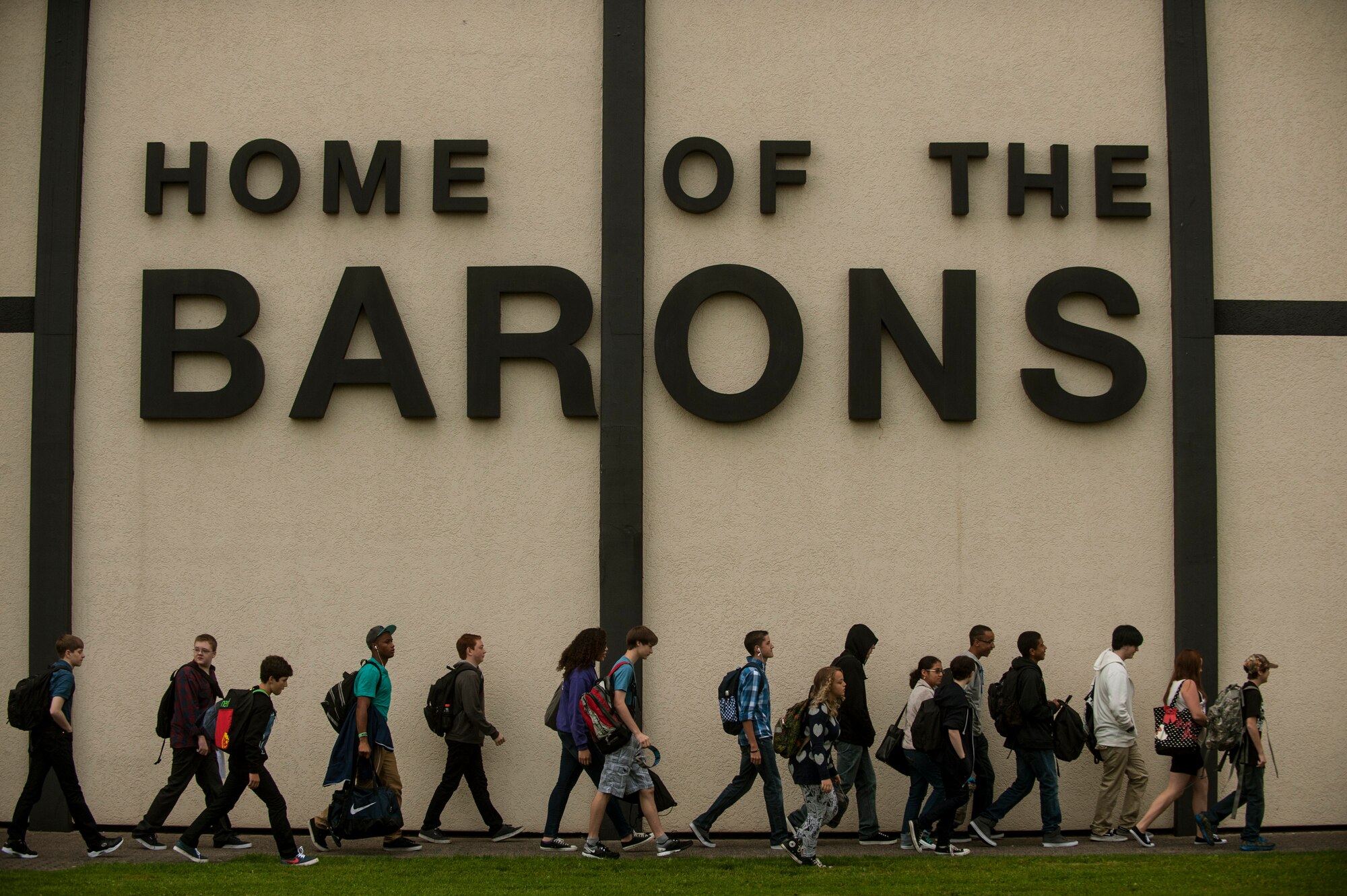Students walk on the Bitburg Middle-High School campus during the first day of school Aug. 25, 2014, at Bitburg Annex, Germany.  More than 240 students will attend the school this year. (U.S. Air Force photo by Senior Airman Rusty Frank/Released)