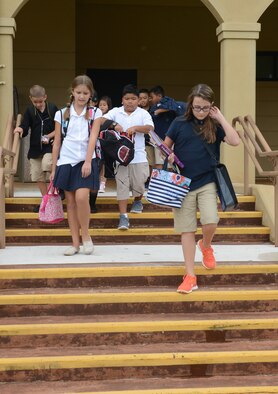 Children of Team Andersen depart Andersen Middle School on Aug. 25, 2014, on Andersen Air Force Base, Guam. Today was the students’ first day back from summer break.  (U.S. Air Force photo by Airman 1st Class Adarius Petty/Released)
