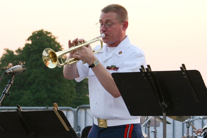Trumpeter Gunnery Sgt. Daniel Orban performs with the Marine Dixieland Band on the west steps of the U.S. Capitol during a Summer Fare concert. (U.S. Marine Corps photo by Staff Sgt. Brian Rust/released)