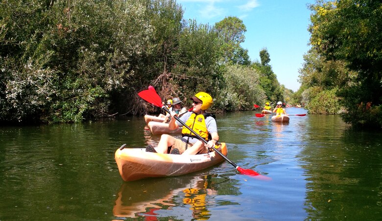 Kayakers paddle along the Los Angeles River in the Sepulveda Basin Aug. 25.