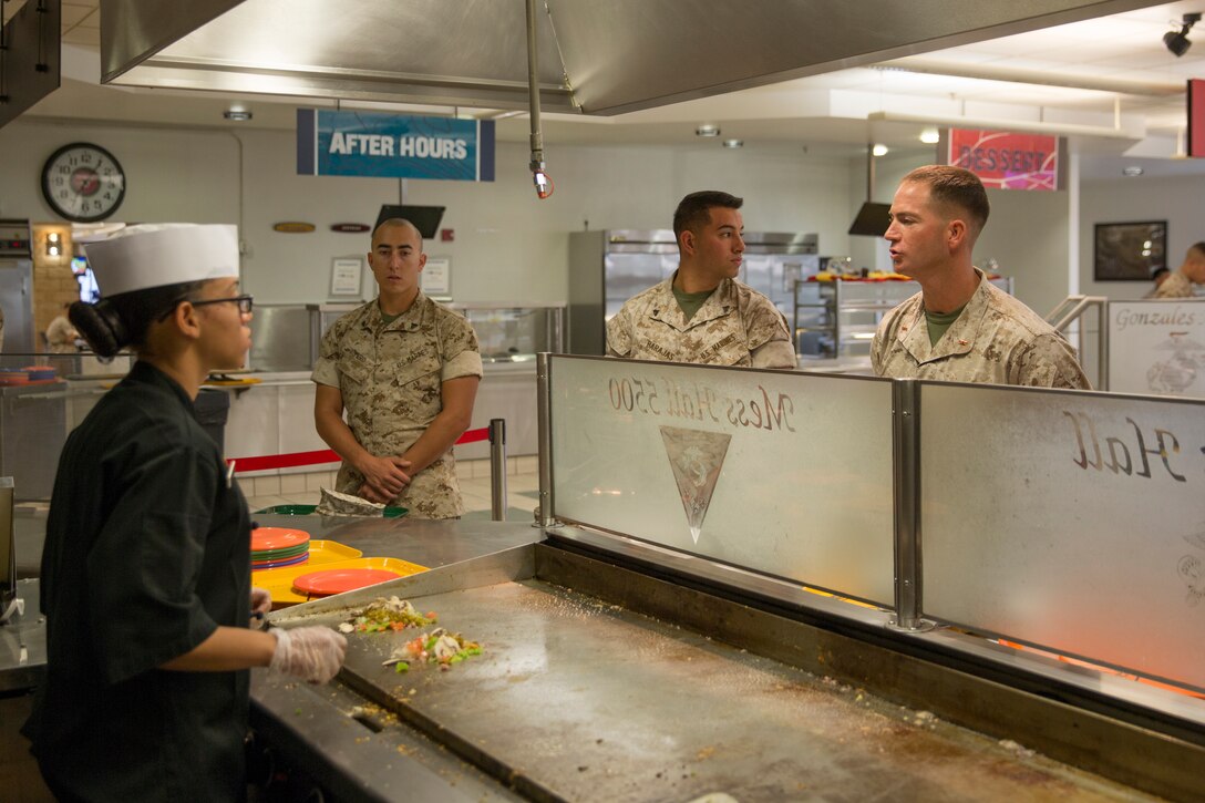 Chief Warrant Officer Jason Davis, food service officer and inspector for the Best of the West competition, orders an omelet from Pfc. Raquel Garcia, a food service technician at Gonzales Hall, during the inspection for the Best of the West competition aboard Marine Corps Air Station Miramar, Calif., Aug. 26. Inspectors are slated to visit several Marine Corps installations along the West Coast to see who has what it takes to earn the title of “Best of the West.”