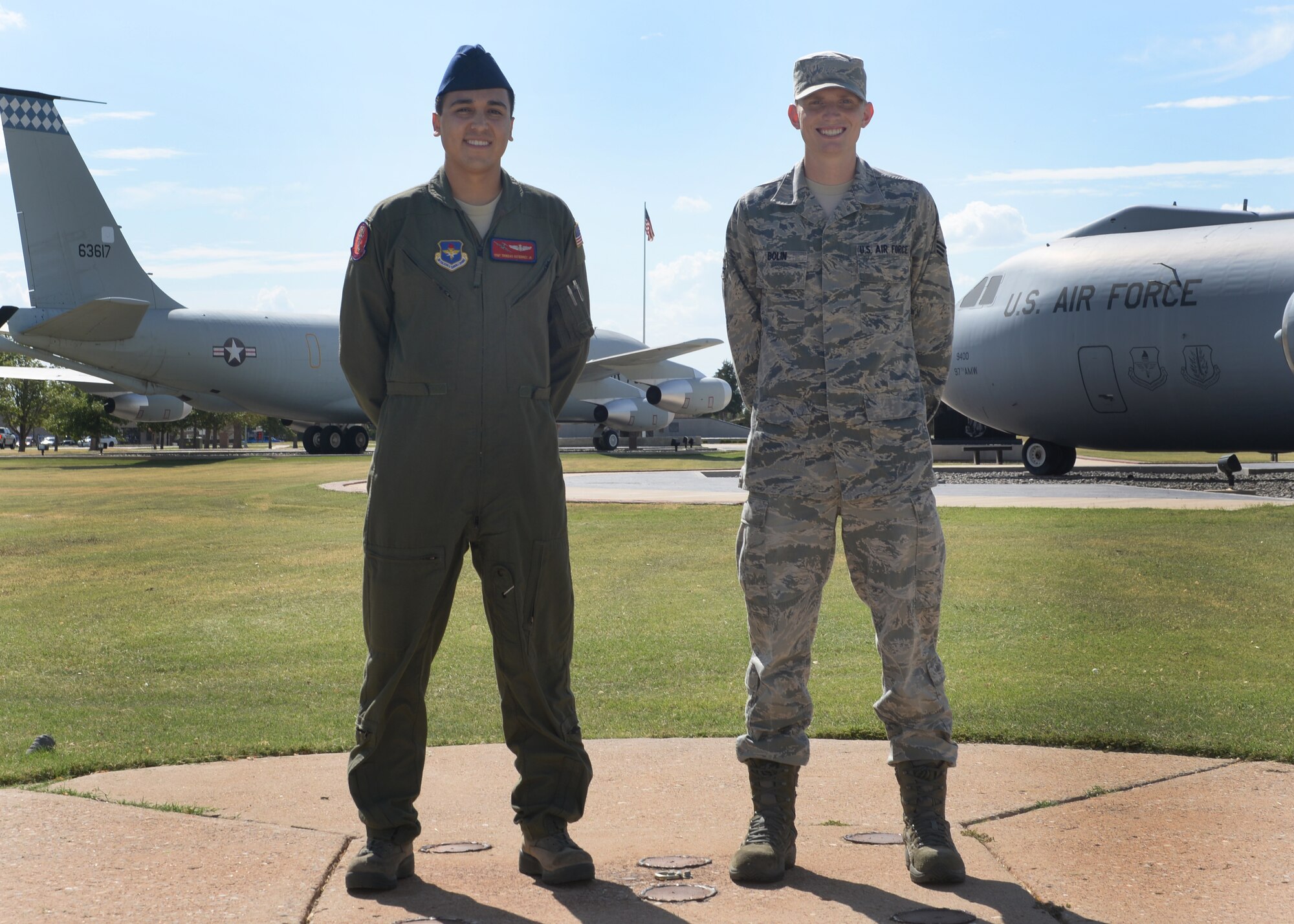 U.S. Air Force Staff Sgt. Trinidad Gutierrez, left, an instructor loadmaster with the 58th Airlift Squadron, and U.S. Air Force Senior Airman Bart Bolin, bioenvironmental engineering technician with 97th Medical Operations Squadron, stand together at Wings of Freedom Park, Aug. 25, 2014. Gutierrez and Bolin plan to run in the Air Force Marathon Sept. 20. (U.S. Air Force photo by Airman 1st Class Nathan Clark/Released) 
