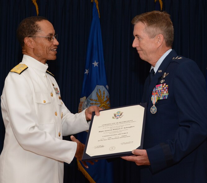 Adm. Cecil D. Haney, U.S. Strategic Command commander, presents Maj. Gen. William Schauffert, Mobilization Assistant to the USSTRATCOM commander, with his retirement certificate during a ceremony August 22, 2014, at Naval Air Station Fort Worth Joint Reserve Base, Texas. USSTRATCOM, located at Offutt Air Force Base, Neb., is one of nine DoD unified combatant commands and is charged with strategic deterrence, space operations, cyberspace operations, joint electronic warfare, global strike, missile defense, intelligence, surveillance and reconnaissance, combating weapons of mass destruction, and analysis and targeting. (U.S. Air Force photo/Staff Sgt. Samantha Mathison)