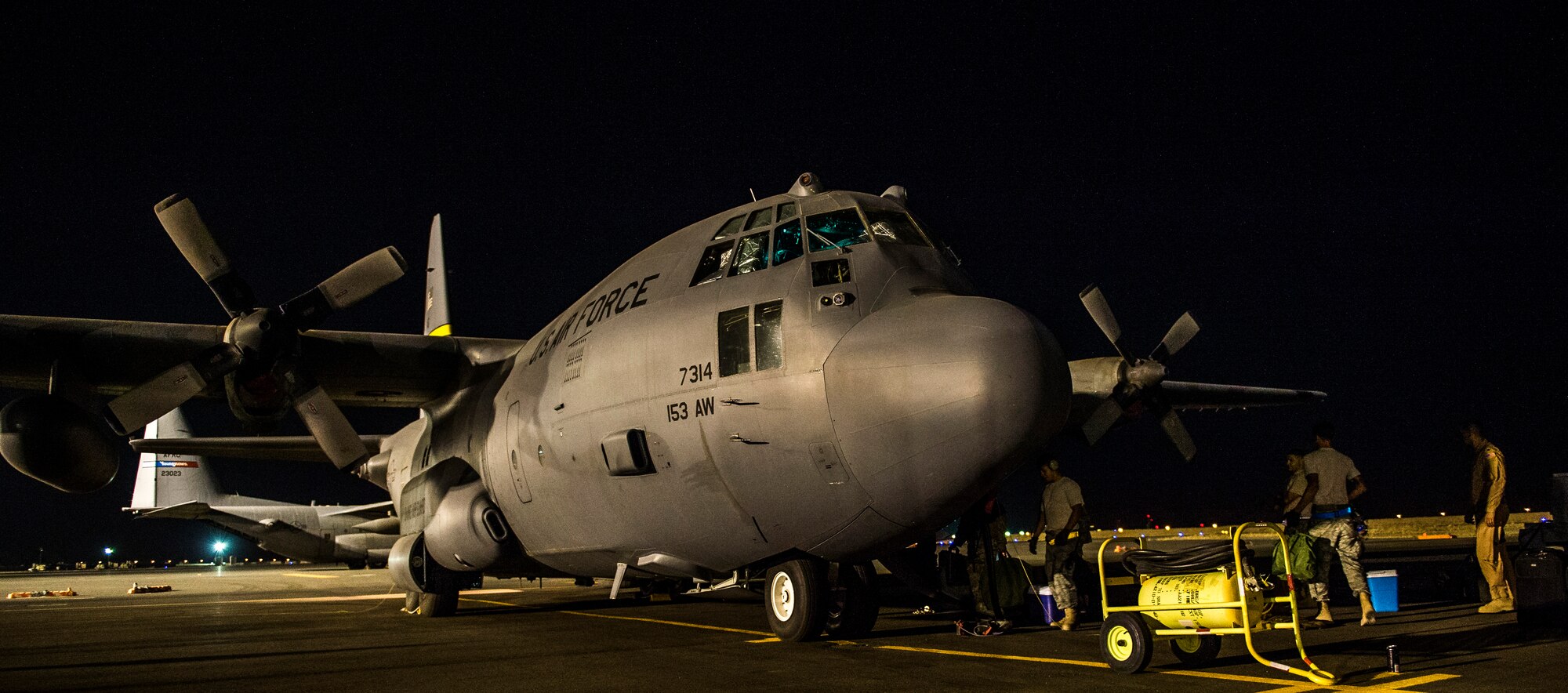 Airmen from the U.S. Central Command area of responsibility prepare a C-130H Hercules for take-off prior to a humanitarian aid mission Aug. 9, 2014. To date, in coordination with the government of Iraq, U.S. military aircraft have delivered more than 52,000 meals and more than 10,600 gallons of fresh drinking water, providing much-needed aid to the displaced Yazidis, who urgently require emergency assistance. (U.S. Air Force photo by Staff Sgt. Jeremy Bowcock)


