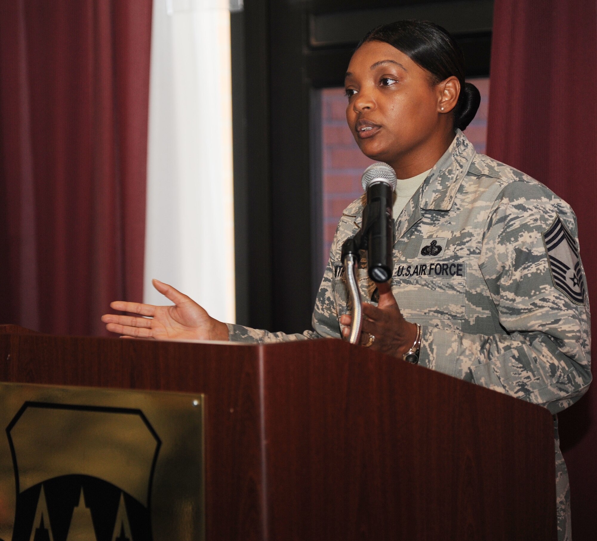 Chief Master Sgt. Melvina Smith, the 71st Mission Support Group superintendent, delivers a speech about women’s equality during the Women’s Equality Day luncheon at the Vance Collocated Club, Aug. 26.  Women’s Equality Day is a day proclaimed each year by the President to commemorate the women’s suffrage.  (U.S. Air Force photo/Staff Sgt. Nancy Falcon)