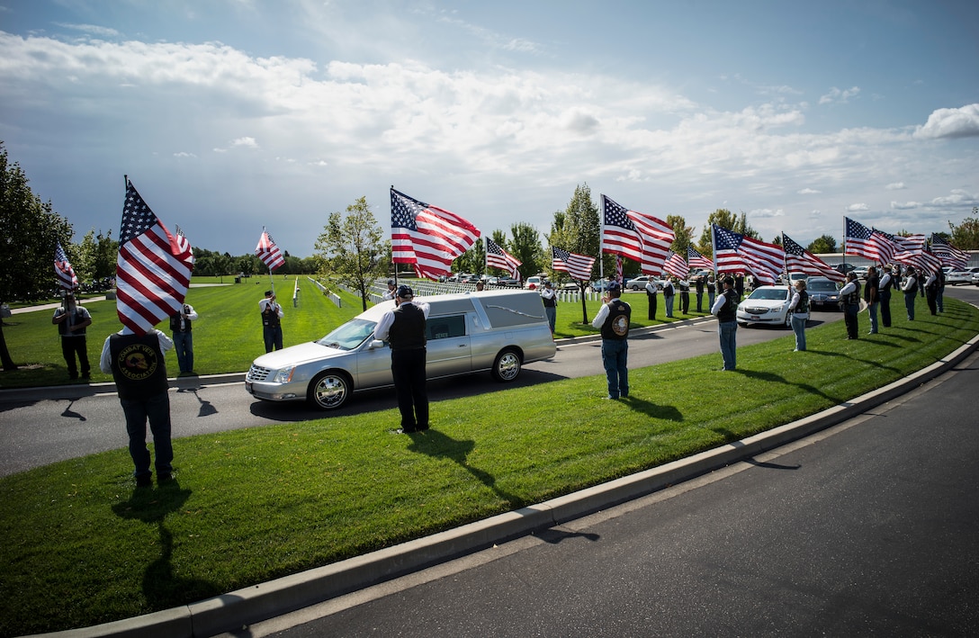 A funeral procession carries Col. (Ret.) Bernard Fisher to his final resting place at Idaho State Veterans Cemetery August 25, 2014, at Boise, Idaho, at Boise, Idaho. Fisher arrived at the 124th Fighter Interceptor Group (ANG), in Boise in July 1971 and retired from this assignment July 30, 1974, making Kuna his permanent home. (U.S. Air Force photo by Tech. Sgt. Samuel Morse/RELEASED)