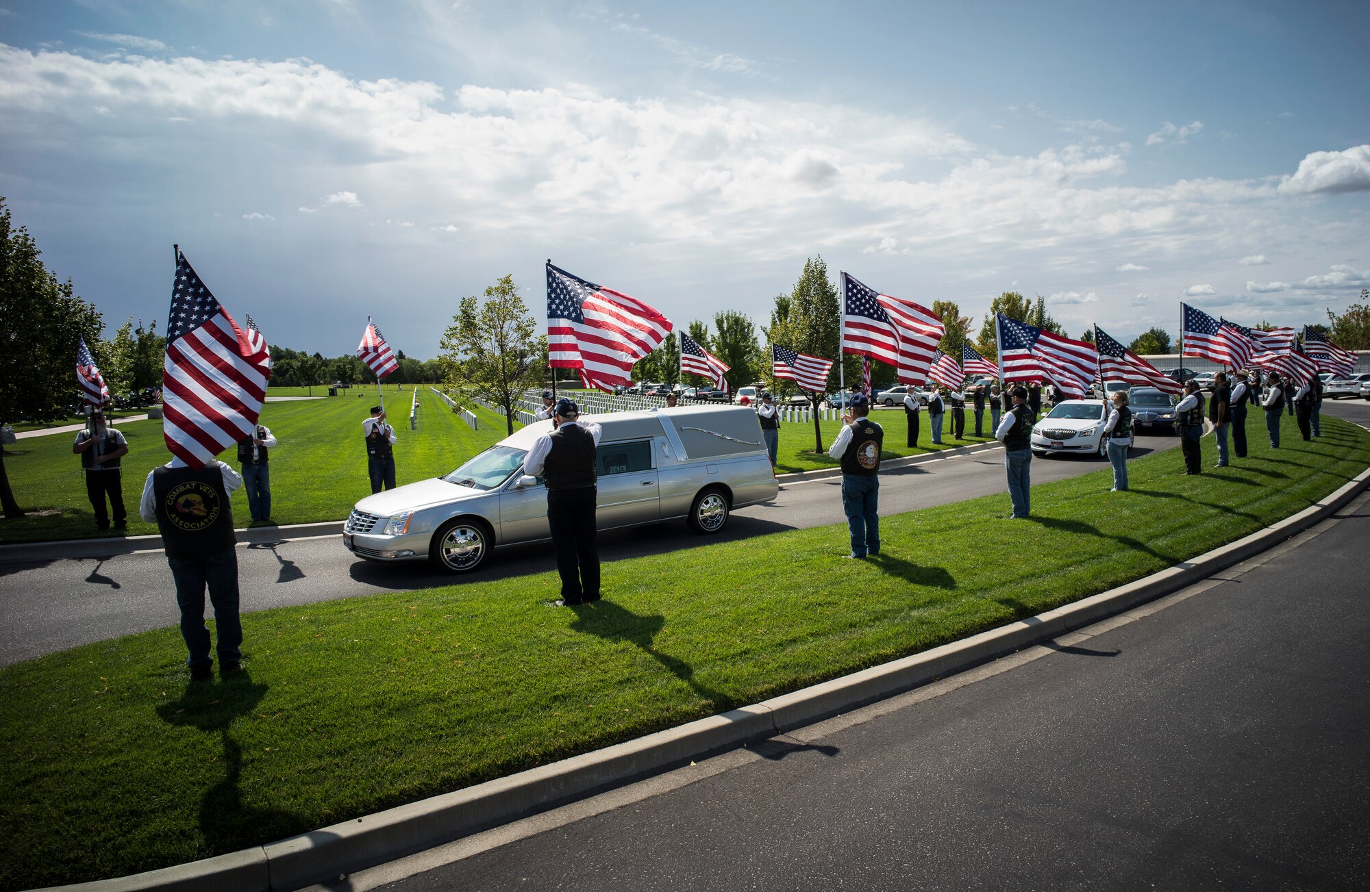 A funeral procession carries Col. (Ret.) Bernard Fisher to his final resting place at Idaho State Veterans Cemetery August 25, 2014, at Boise, Idaho, at Boise, Idaho. Fisher arrived at the 124th Fighter Interceptor Group (ANG), in Boise in July 1971 and retired from this assignment July 30, 1974, making Kuna his permanent home. (U.S. Air Force photo by Tech. Sgt. Samuel Morse/RELEASED)