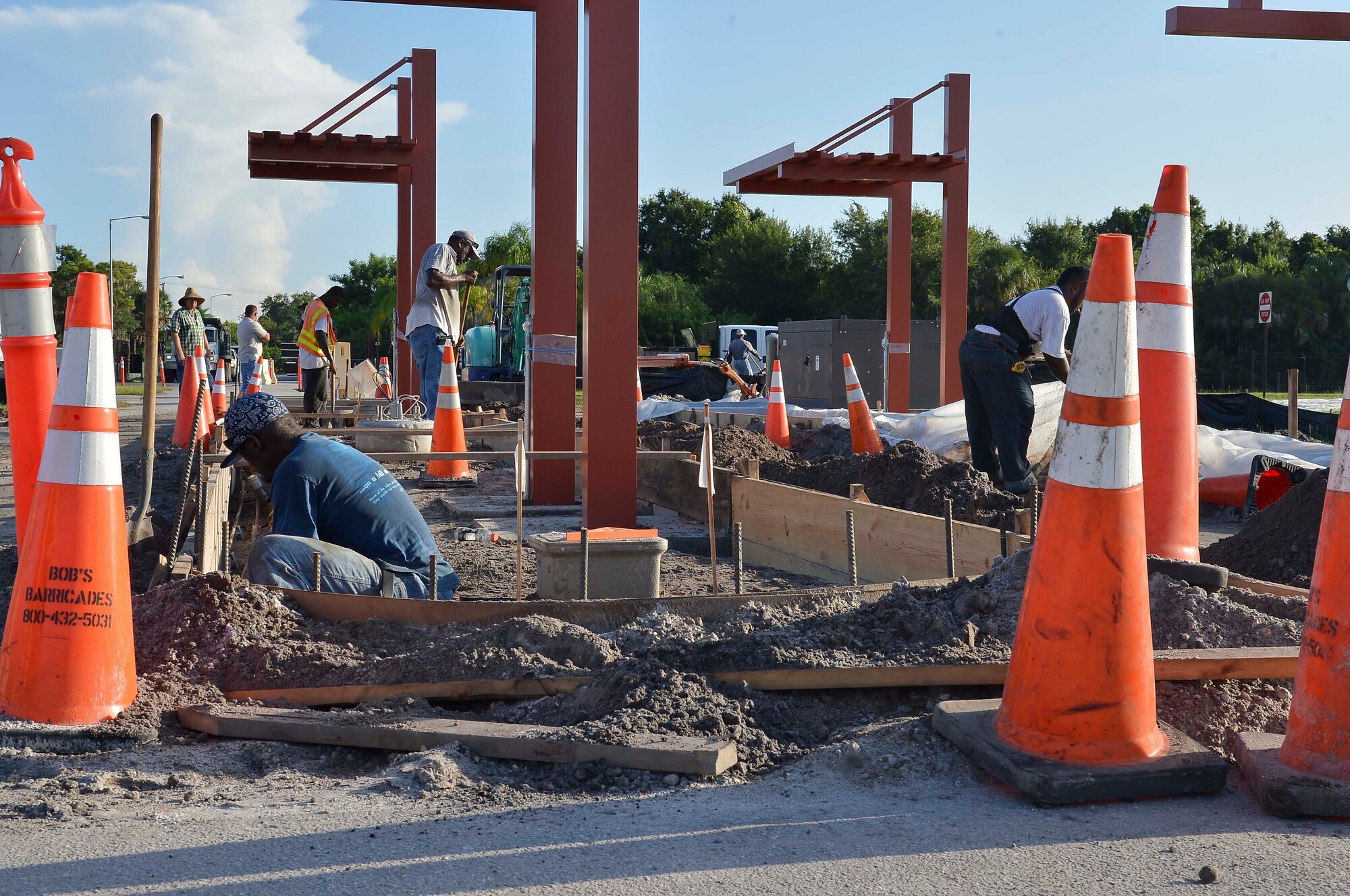 Gate construction is on-going at Tanker gate Aug. 18, 2014 at MacDill Air Force Base, Fla. To try and eliminate the morning traffic an additional incoming traffic lane is being created between Interbay Ave and Tanker gate commercial vehicle inspection area, along with additional roadway pavements, new bollards and relocated denial barriers to stay in compliance with standards for the reaction and deployment time.(U.S. Air Force photo by Senior Airman Jenay Randolph/Released)