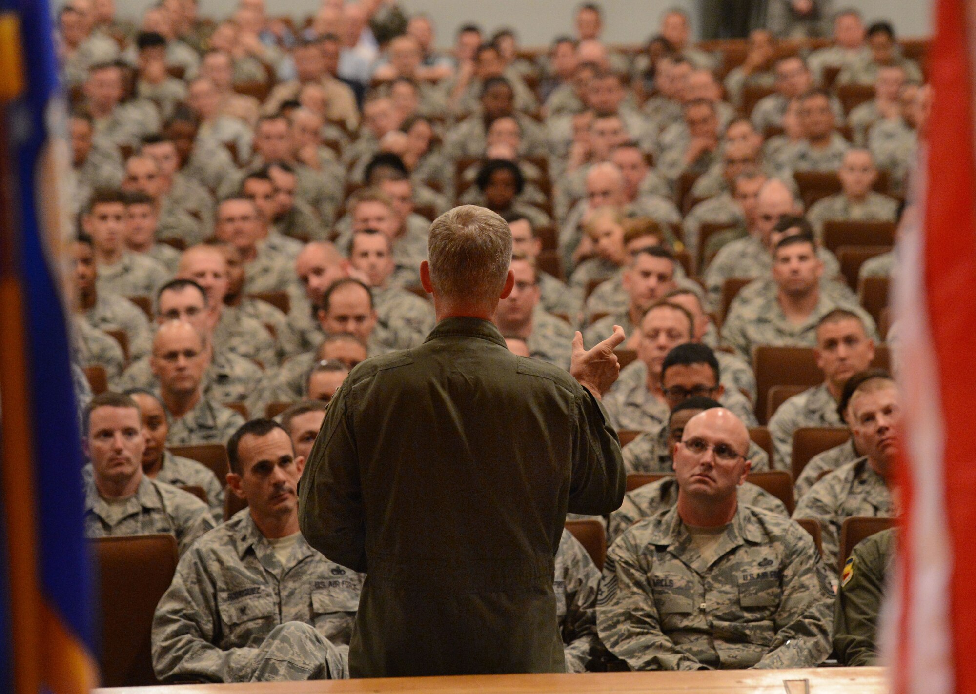 U.S. Air Force Gen. Mike Hostage, commander of Air Combat Command, speaks with members of Team Shaw during an all-call at Shaw Air Force Base, S.C., Aug. 20, 2014. Hostage opened the floor for questions so Airmen could express their concerns. (U.S. Air Force photo by Senior Airman Tabatha Zarrella/Released)