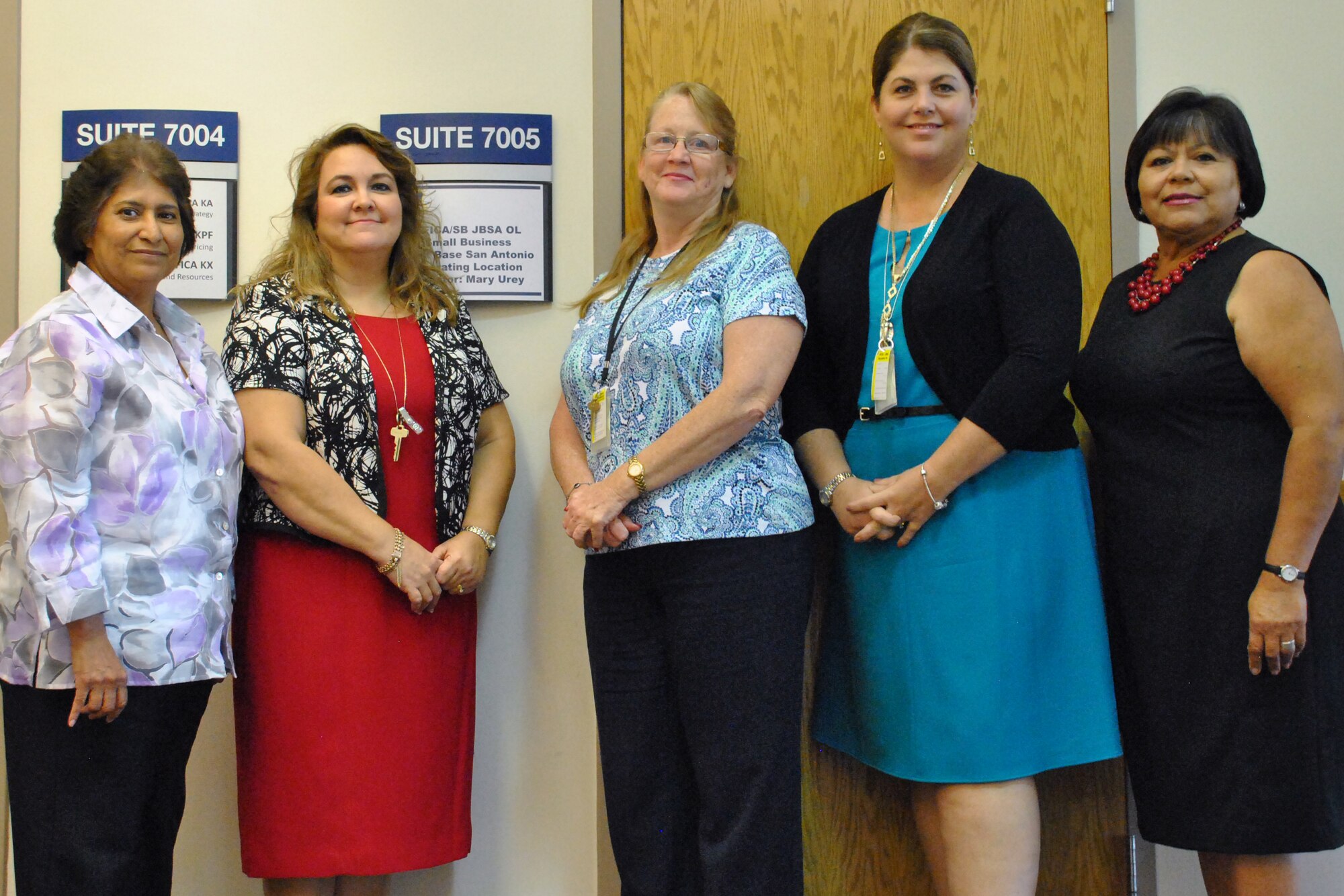 Members of the Air Force Installation Contracting Agency’s Joint Base San Antonio operating location recently received the 2014 Secretary of the Air Force Small Business Director's Beyond Goals Award. The team manages and oversees the Air Force Civil Engineer Center’s Small Business Program. From left, members of the team include Grace Elizalde, Liz Tijernia, Mary Urey, Debra Harber and Mere Rodriguez. (U.S. Air Force photo/Shannon Carabajal)