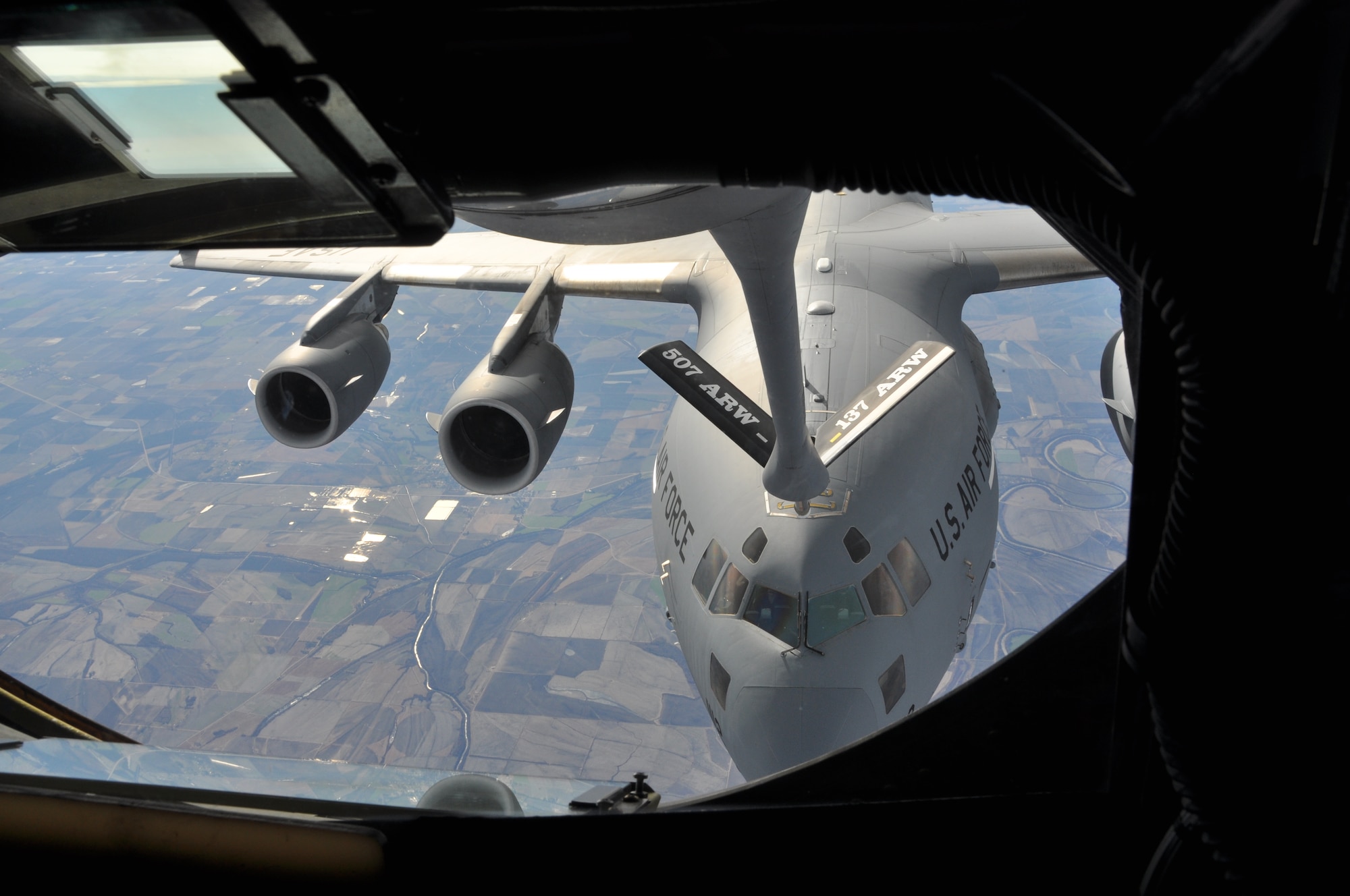 A C-17 Globemaster III receives fuel from a 507th Air Refueling Wing KC-135 Stratotanker in a recent training mission.  The 507th ARW received command responsibility for the 730th Air Mobility Training Squadron, the first classic associate unit in the Air Force. Reservists in the unit work next to active duty Airmen of the 97th Air Mobility Wing, training C-17 and KC-135 aircrew members for Air Education and Training Command. (U.S. Air Force Photo/Maj. Jon Quinlan) 