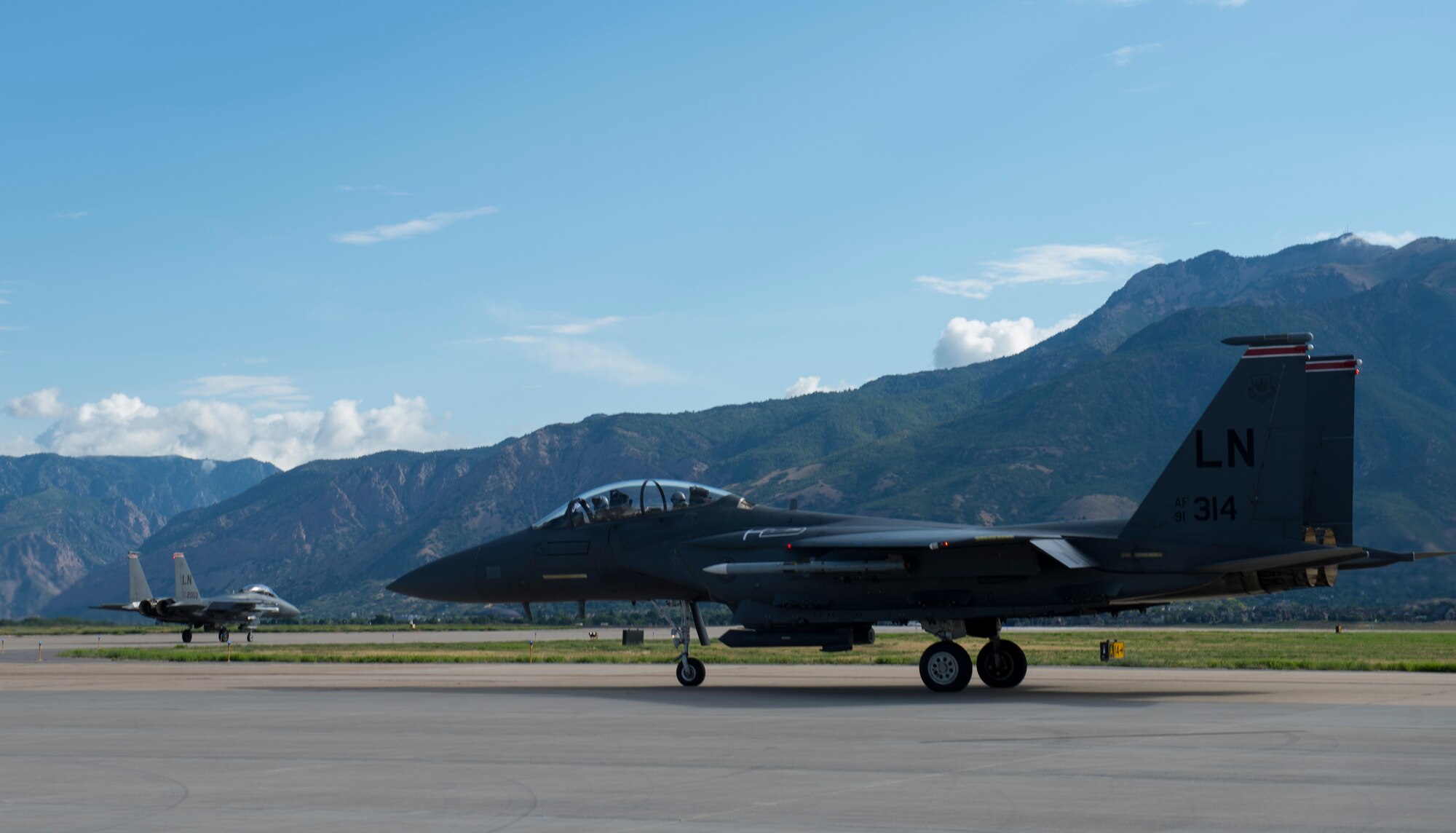 An F-15 Eagle from Royal Air Force, Lakenheath, England, taxis to the runway on Hill Air Force Base, Utah, Aug. 20, 2014. F-15s from RAF Lakenheath and F-16s from Aviano Air Base, Italy, were at Hill AFB for a Weapon System Evaluation Program. (U.S. Air Force photo by Airman 1st Class Joshua King/Released)