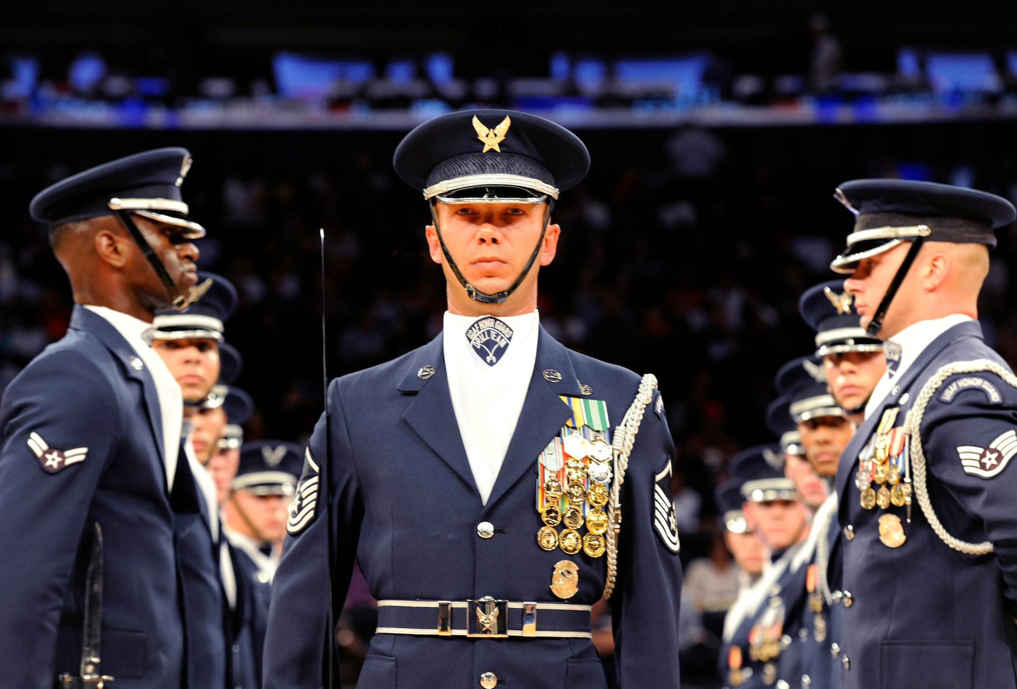 Master Sgt. Scott Slindee, the United States Air Force Honor Guard Drill Team superintendent, stands tall before his Airmen during a performance at Madison Square Garden, New York, August 22, 2014. The Drill Team promotes the Air Force mission by showcasing drill performances at public and military venues to recruit, retain and inspire Airmen. (U.S. Air Force photo/Airman 1st Class Ryan J. Sonnier)