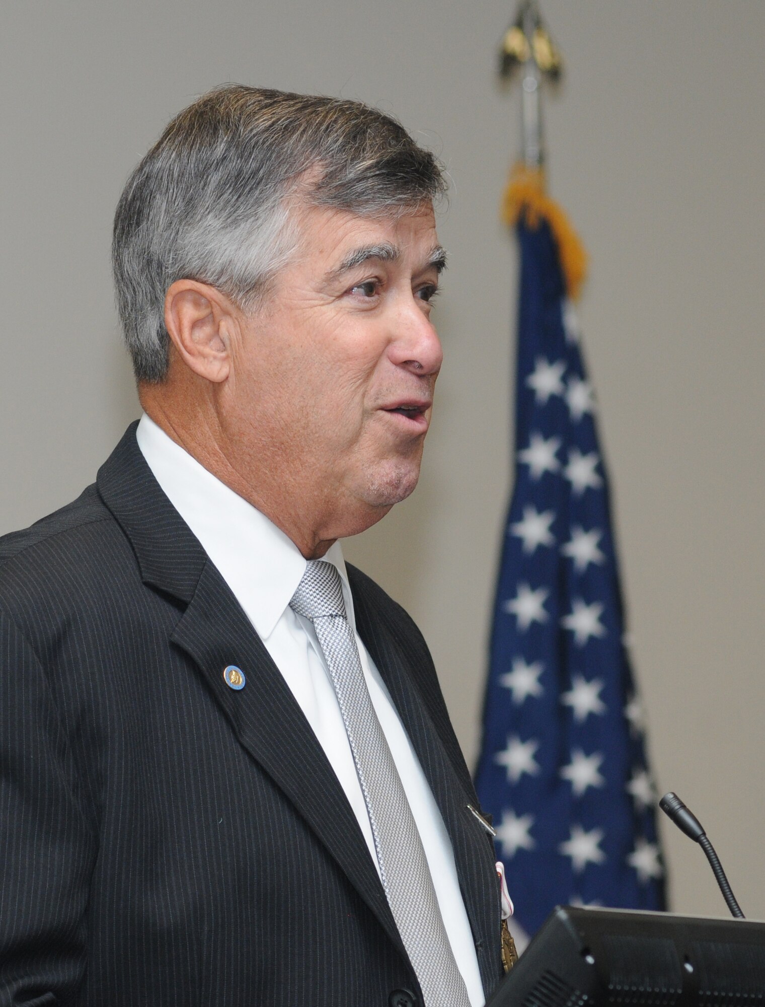 James Hollingsworth, 2nd Air Force, speaks during his retirement ceremony Aug. 25, 2014, at the Roberts Maintenance Facility, Keesler Air Force Base, Miss.  Hollingsworth retired with more than 45 years of combined military and civilian service. (U.S. Air Force photo by Kemberly Groue) 