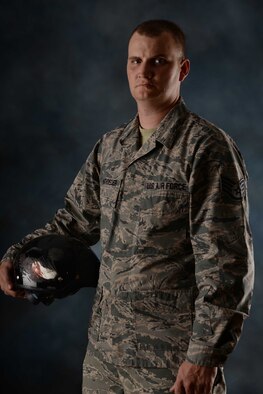 Staff Sgt. Bobby Pantfoeder, Ellsworth Honor Guard NCO in charge, stands fully recovered from his motorcycle crash during an interview at Ellsworth Air Force Base, S.D. August 21, 2014. The safety equipment Pantfoeder was wearing saved his life during the accident that happened earlier this summer. (U.S. Air Force photo by Airman 1st Class Rebecca Imwalle/Released)