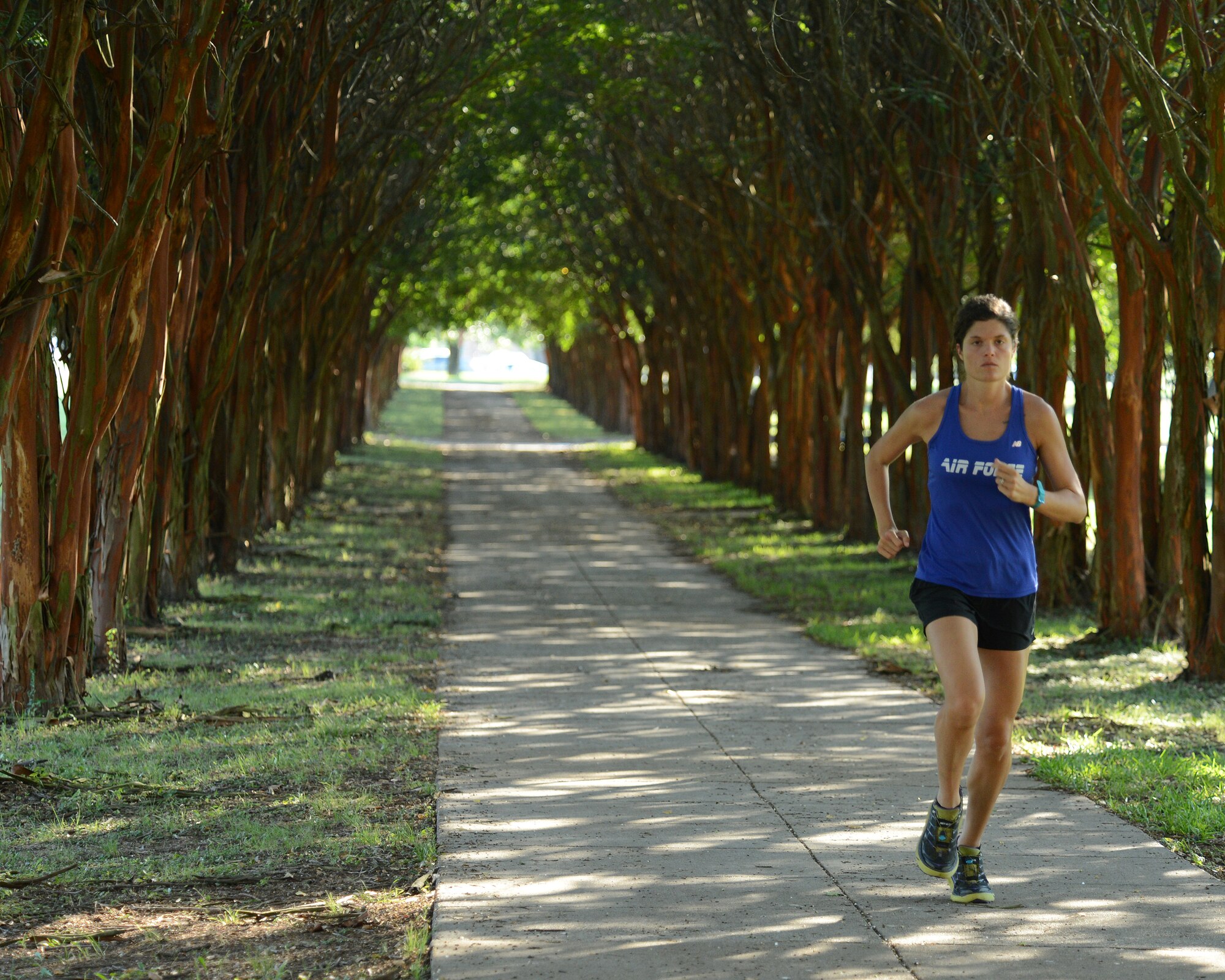 1st Lt. Katherine Ward, 608th AOC deputy chief intelligence, reconnaissance and surveillance deputy chief, trains for the World Class Athlete Program at Louisiana State University Shreveport on Aug. 14, 2014. The Air Force World Class Athlete Program is a two-year program that provides active duty, national guard and reserve Air Force personnel the opportunity to train and compete at national and international sports competitions with the ultimate goal of selection to the United States Olympic team. (U.S. Air Force photo/Senior Airman Benjamin Gonsier)