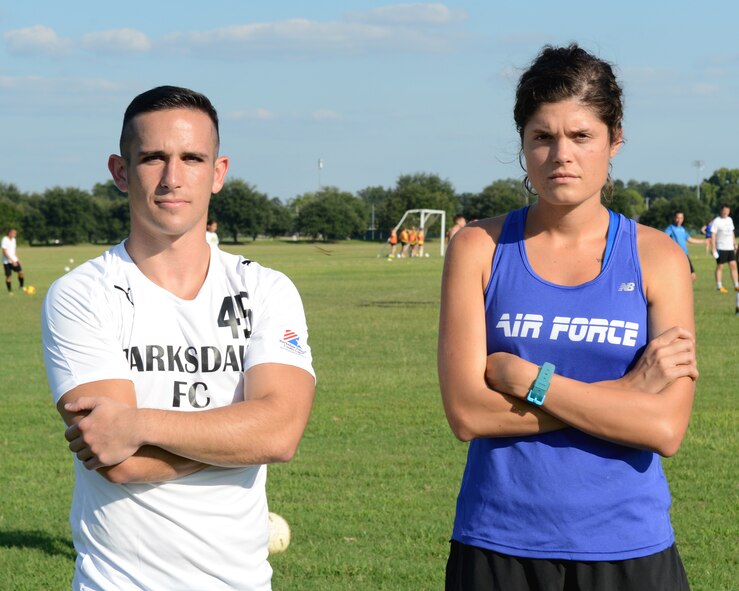 2nd Lt. Anthony D'Errico, 608th Air Operations Center executive officer and 1st Lt. Katherine Ward, 608th AOC deputy chief intelligence, reconnaissance and surveillance deputy chief, pose for a photo at Louisiana State University Shreveport on Aug.14, 2014. D'Errico and Ward were recently chosen for the Air Force World Class Athlete Program. (U.S. Air Force photo/Senior Airman Benjamin Gonsier)