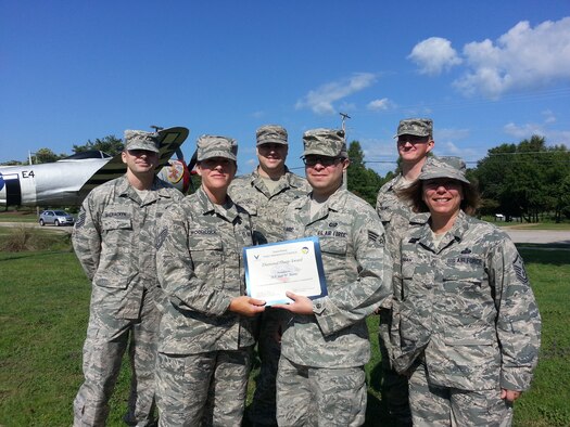 Senior Airman Sean Harris, 31th Intelligence Squadron Detachment 1 geospatial intelligence analyst, is recognized by members of the Shaw First Sergeants Council as "Diamond Sharp." Diamond Sharp, the First Sergeant Council’s program, aims to recognize two Airmen from across Shaw Air Force base monthly. (Courtesy photo)