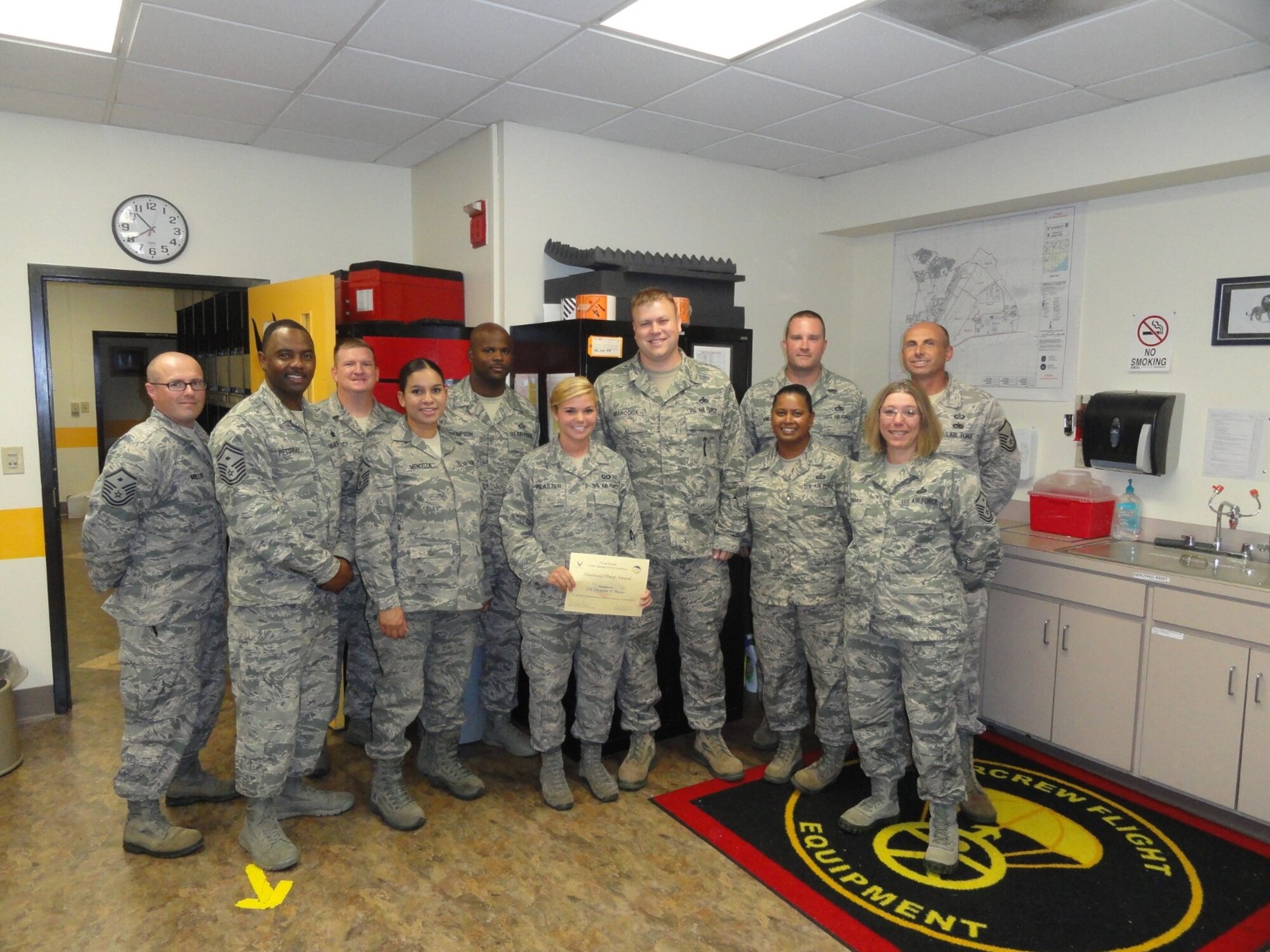 Airman 1st Class Cheyenne Plaster, 20th Operations Support Squadron aircrew flight equipment apprentice, is recognized by members of the Shaw First Sergeants Council as "Diamond Sharp." Diamond Sharp, the First Sergeant Council’sprogram, aims to recognize two Airmen from across Shaw Air Force base monthly. (Courtesy photo)
