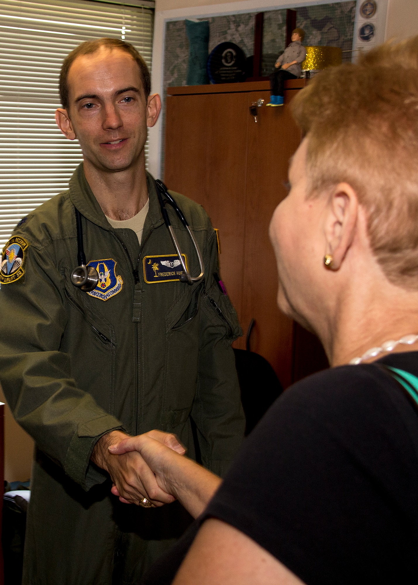 Undersecretary of Defense for Personnel and Readiness Jessica Wright chats with Dr. (Lt. Col.) Frederick Huiet, 315th Aerospace Medicine Squadron Saturday, Aug. 23 in the flight medicine section of the health clinic. Wright visited Joint Base Charleston Aug. 22 and 23 to discuss resiliency and to promote sexual assault prevention and reporting with service members. (U.S. U.S. Air Force Photo / Michael Dukes)
