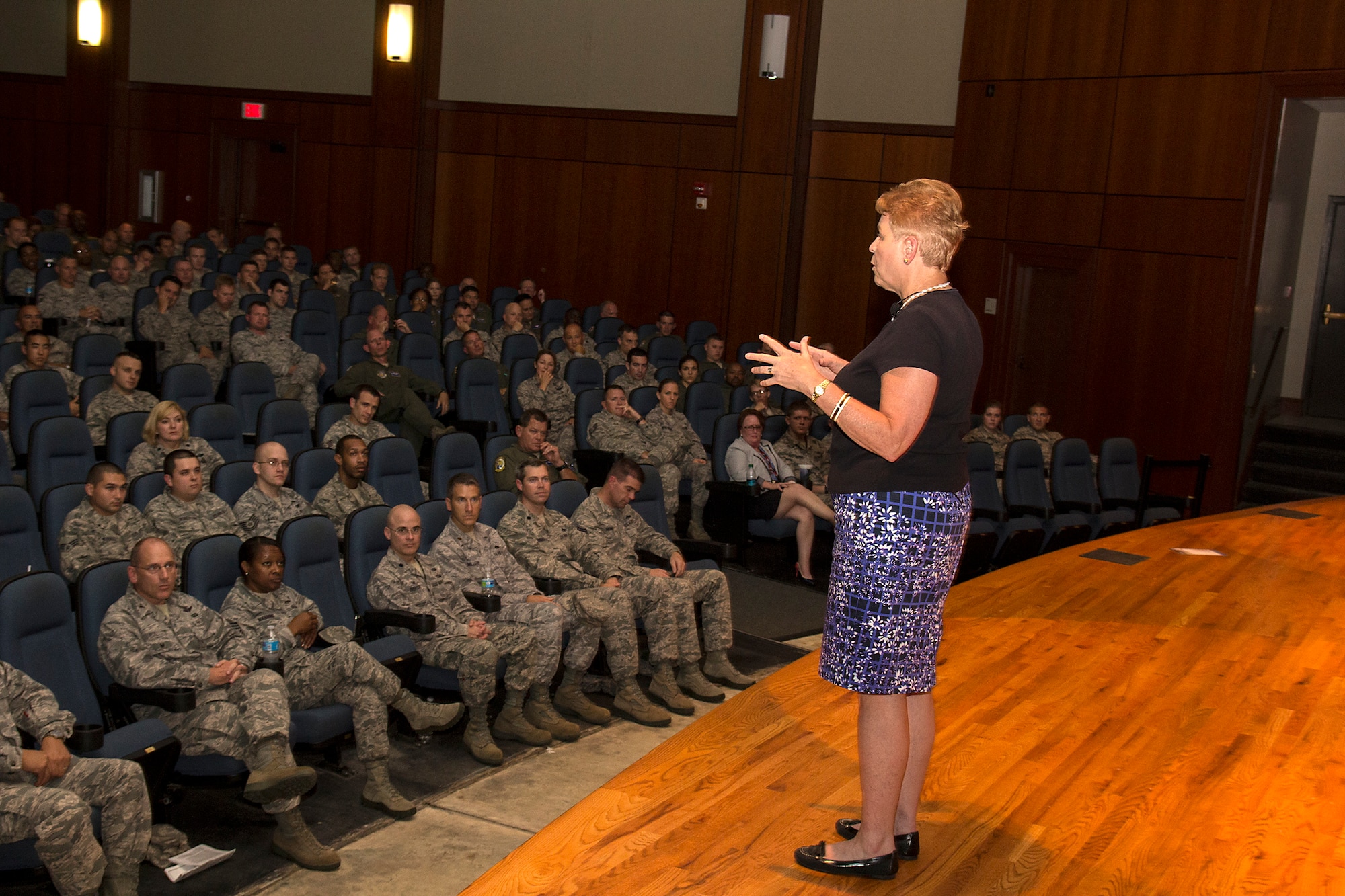 Undersecretary of Defense for Personnel and Readiness Jessica Wright speaks to Reserve and active duty Airmen at an all call in the base theater Saturday, Aug. 23. Wright visited the world’s largest C-17 base Aug. 22 and 23 to learn of the Team Charleston mission and discuss resiliency and to promote sexual assault prevention and reporting with service members. (U.S. Air Force Photo / Michael Dukes)