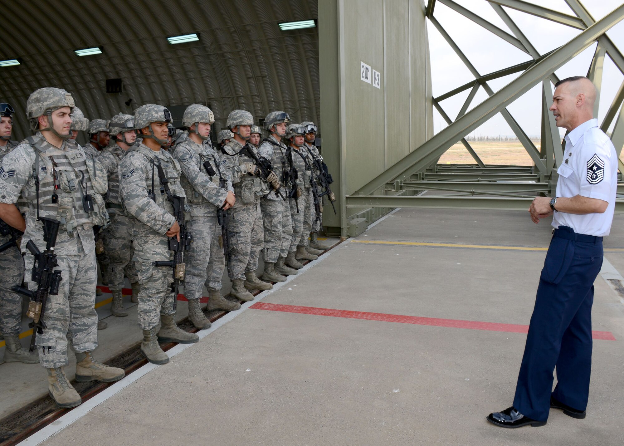 Chief Master Sgt. Mark Marson, 3rd Air Force command chief, speaks to 39th Security Forces Airmen Aug. 19, 2014, Incirlik Air Base, Turkey. Marson along with Lt. Gen. Darryl Roberson, 3rd AF commander, arrived in Turkey to visit Airmen stationed at various locations around the country. Marson described the importance of the 39th SFS mission in the region to the Airmen, and commended their work. (U.S. Air Force photo by Staff Sgt. Veronica Pierce/Released)