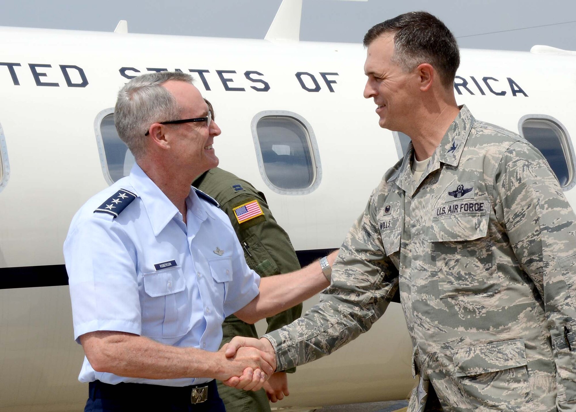 Col. Craig Wills, 39th Air Base Wing commander, greets Lt. Gen. Darryl Roberson, 3rd Air Force commander, after his arrival, Aug. 19, 2014, Incirlik Air Base, Turkey. Roberson visited with U.S. Airmen across Turkey to see how they support U.S. Air Forces in Europe and Air Forces Africa by being Forward. Ready. Now! (U.S. Air Force photo by Staff Sgt. Veronica Pierce/Released)