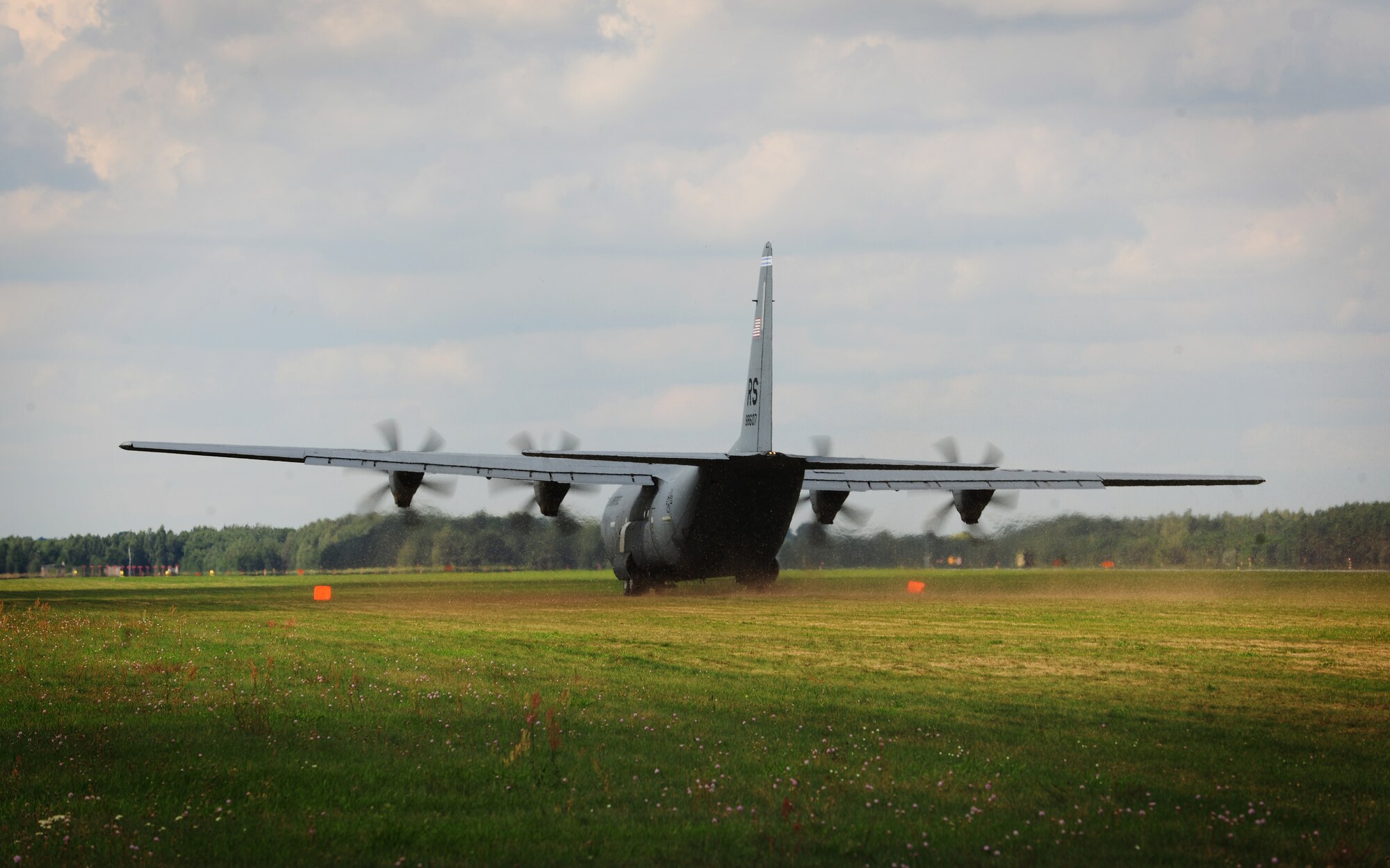 A C-130J Super Hercules takes off from an unimproved runway at Powidz Air Base, Poland, Aug. 25, 2014. Throughout the deployment to Poland, Airmen served as America’s forward presence in Europe and a vital link to Operation Atlantic Resolve. (U.S. Air Force photo by Staff Sgt. Jarad A. Denton/Released)