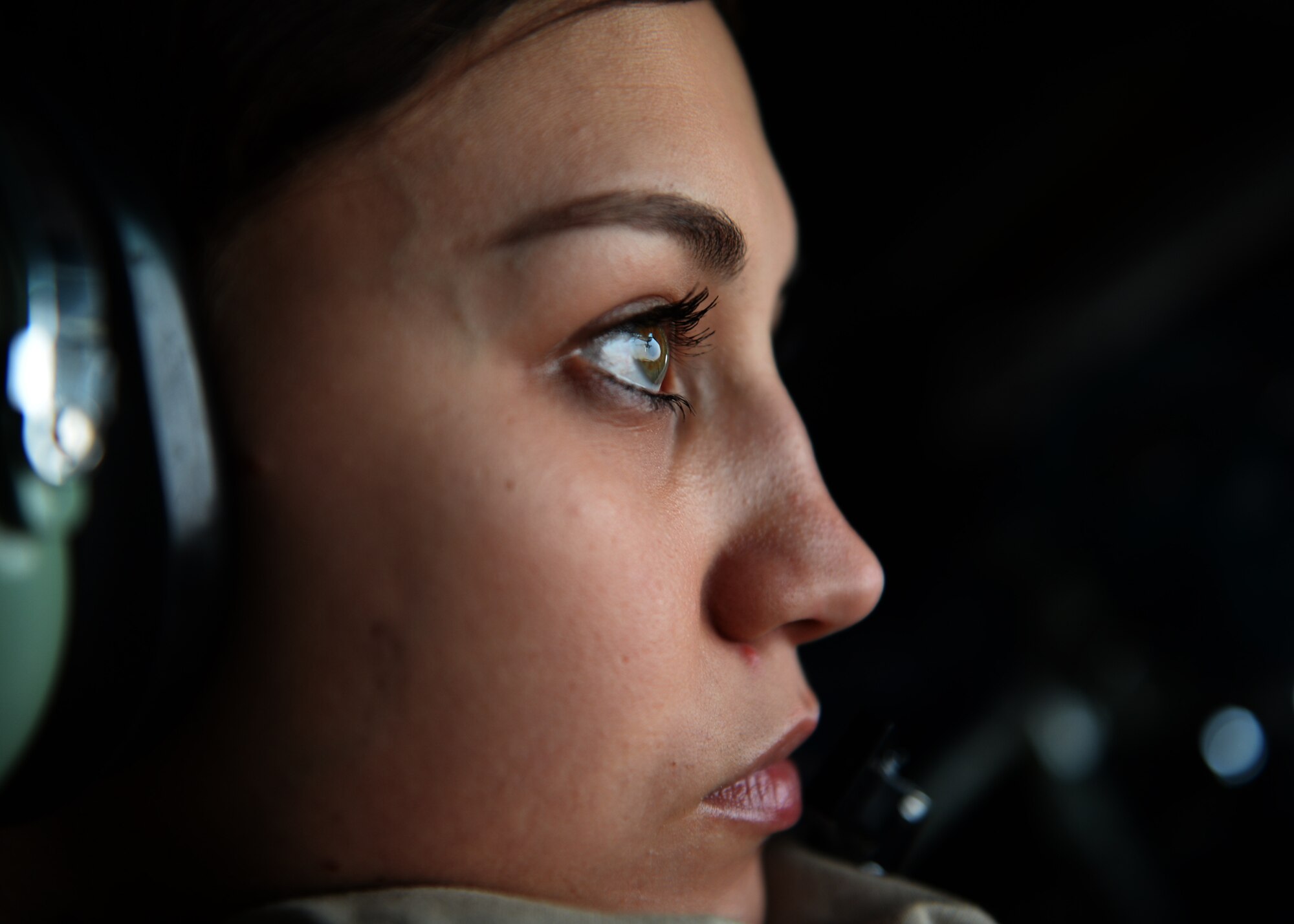 MIDDLE EAST - Senior Airman Crystal Cash, a 340th Expeditionary Air Refueling Squadron boom operator, focuses on an aircraft she is refueling Aug. 21 over Northern Iraq. The mission was to support fighter and reconnaissance aircraft conducting missions over Iraq. (U.S. Air Force photo by Staff Sgt. Shawn Nickel)