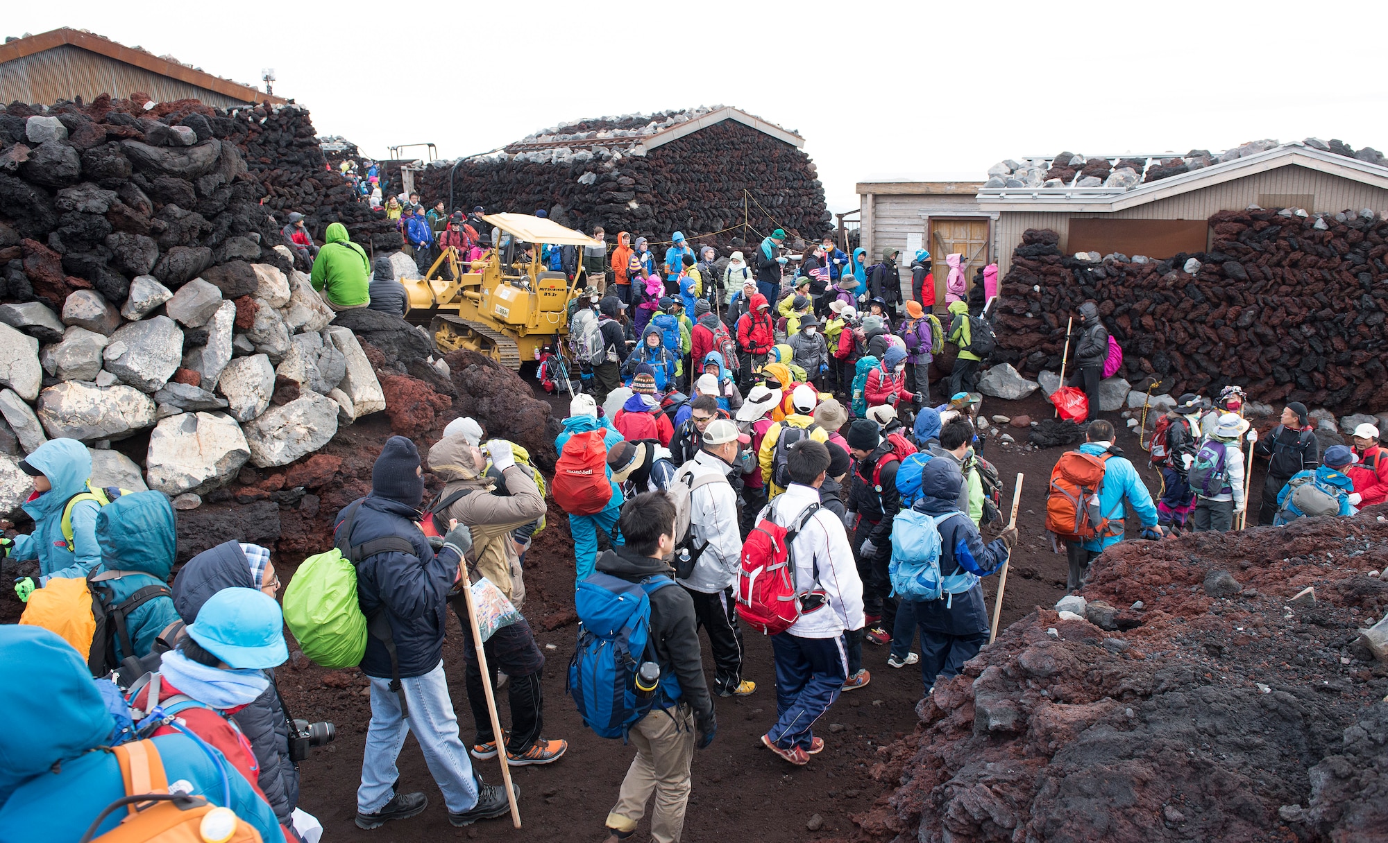 Hikers can find a number of vendors at the top of Mount Fuji, Japan, selling food, drinks and postcards from the summit.  Prepared hikers come with cold weather gear, as the temperature at the summit approaches freezing even during the hottest summer months.  (U.S. Air Force photo by Tech. Sgt. Christopher Marasky/Released)