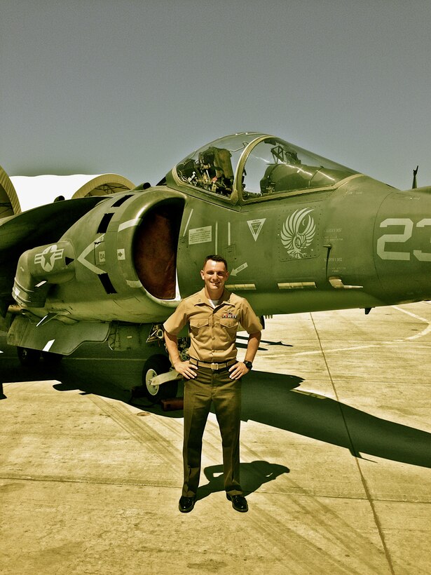 MARINE CORPS AIR STATION YUMA, Ariz.- Capt. Nicholas Dimitruk stands in front of an AV-8B Harrier on the flightline at MCAS Yuma. Dimitruk is a forward air controller with Battalion Landing Team 3rd Battalion, 5th Marines, 31st Marine Expeditionary Unit, and a native of Wimbledon, England. Dimitruk and the Marines of BLT 3/5 are currently assigned to the 31st MEU as the ground combat element and are conducting pre-deployment preparations in support of the regularly scheduled Fall Patrol of the Asia-Pacific region. 