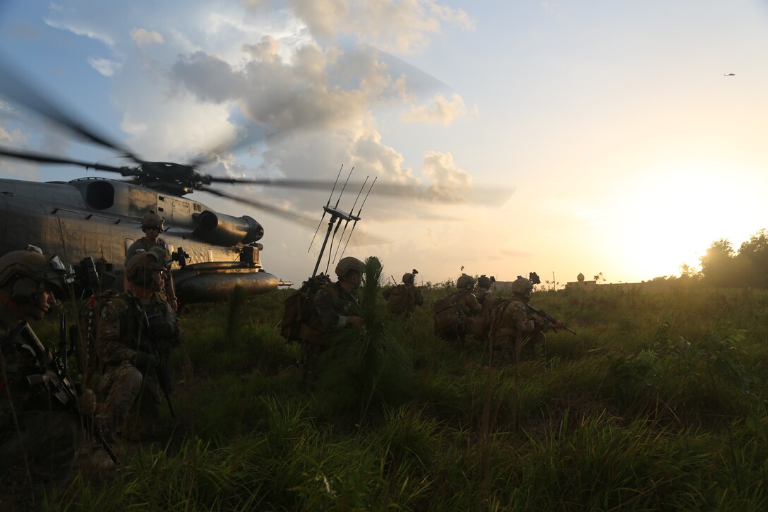 A Marine with Echo Company, 2nd Battalion, 8th Marine Regiment, provides security during a partner nation force training exercise at Hurlburt Field, Fla., Aug. 17 – 27.  The Marines of 2/8 joined forces with Critical Skill Operators with U.S. Marine Corps Forces Special Operations Command to strengthen the process-driven capability integration process between Special Operations Forces and the Marine Air Ground Task Force and to increase the Marine Corps’ and MARSOC’s ability to partner with foreign counterparts to advise, train and assist allied security forces. Throughout the 10-day training evolution, Marines with 2/8 played the role of a notional partner nation force, while MARSOC Critical Skills Operators and Special Operations Officers advised, trained and assisted 2/8, increasing both MARSOC’s and 2/8’s ability to advise, train and assist partner nation forces throughout the globe.