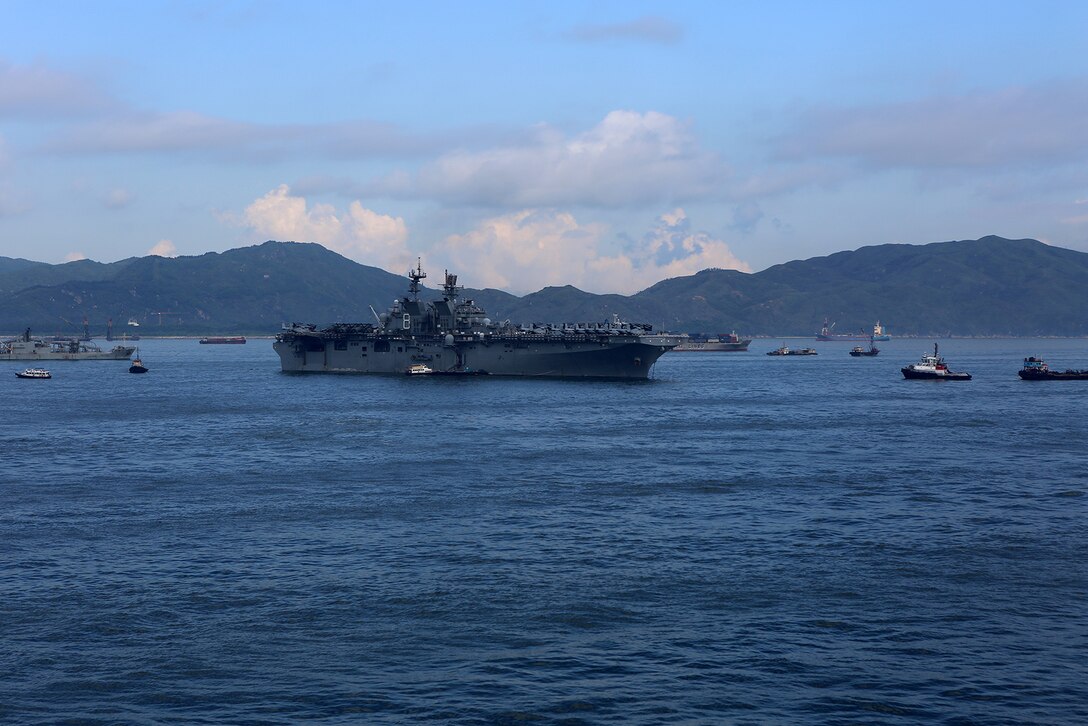 The USS Makin Island, embarked with Marines and sailors from the11th Marine Expeditionary Unit, remains anchored off the coast of Hong Kong, Aug. 23. The 11th MEU and Makin Island Amphibious Ready Group are deployed to the U.S. 7th Fleet area of operations as a sea-based, expeditionary crisis response force capable of conducting amphibious missions across the full range of military operations. (U.S. Marine Corps photo by Sgt. Melissa Wenger/Released)