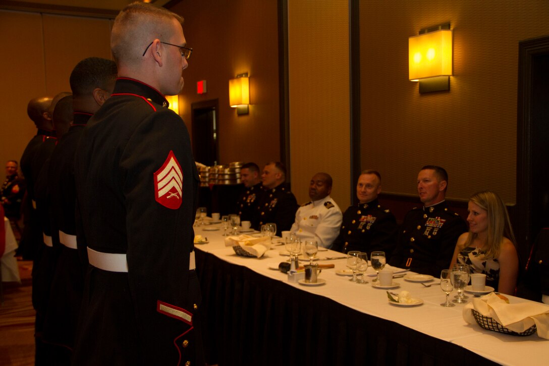 Sgt. Matthew Rardin and his fellow recruiters from Recruiting Substation North Milwaukee are called to the head table during Recruiting Station Milwaukee’s first Dining Out, Aug. 20 in Brown Deer, Wis.  A Dining Out is conducted in the same manner as a traditional Mess Night but it is open to spouses and guests.