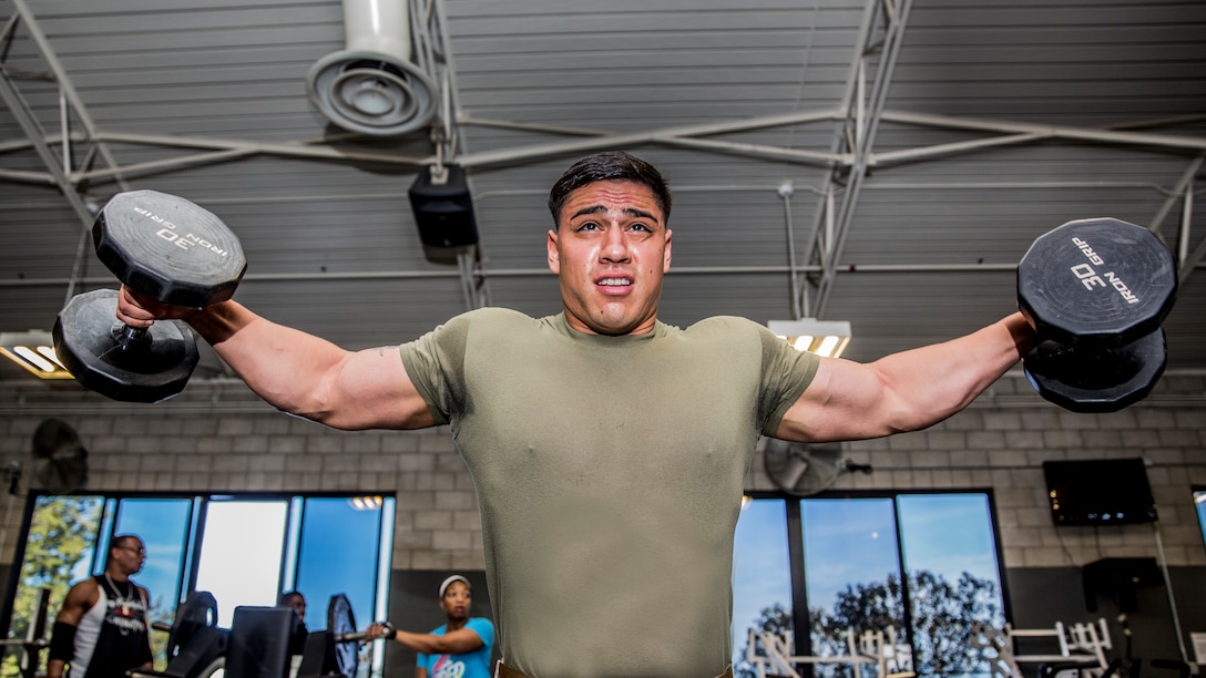 Corporal Freddy Cantu pushes his body to its physical limitations during a workout session aboard Camp Pendleton, Calif., on Aug. 25, 2014. Cantu, 22, is from Bakersfield, Calif., and is a cyber-network administrator for the 15th Marine Expeditionary Unit. (U.S. Marine Corps photo by Sgt. Emmanuel Ramos/Released)