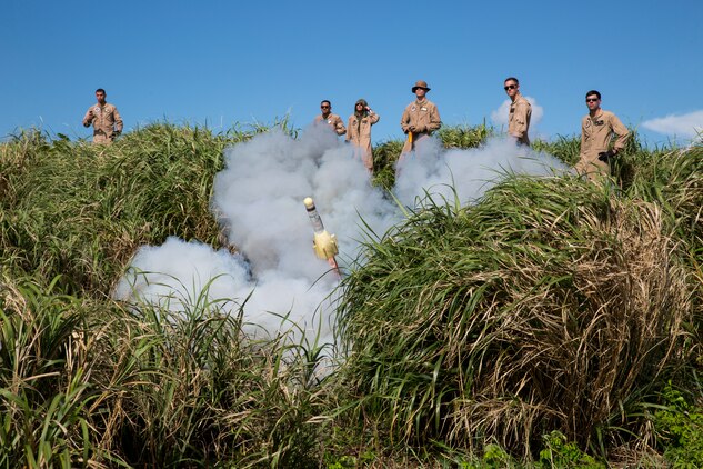 Marine Aerial Refueler Squadron 152 ordnance Marines watch a GTR-18 missile, better known as a "Smokey SAM," launch during a threat reaction evolution on an island outside of Okinawa, Japan, Aug. 26, 2014. The threat reaction evolution is a chance for pilots to stay up to date on their qualifications while keeping an alert and aware mindset for any arising combat scenario.
